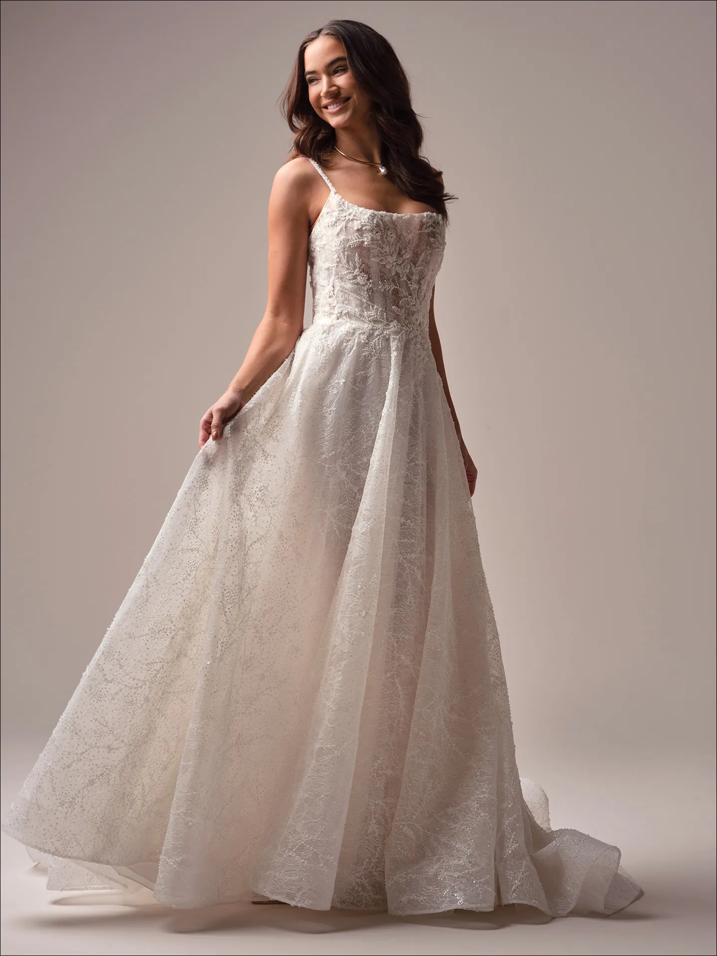Maggie Sottero Salvadora A line wedding dress front view with lace bodice and skirt