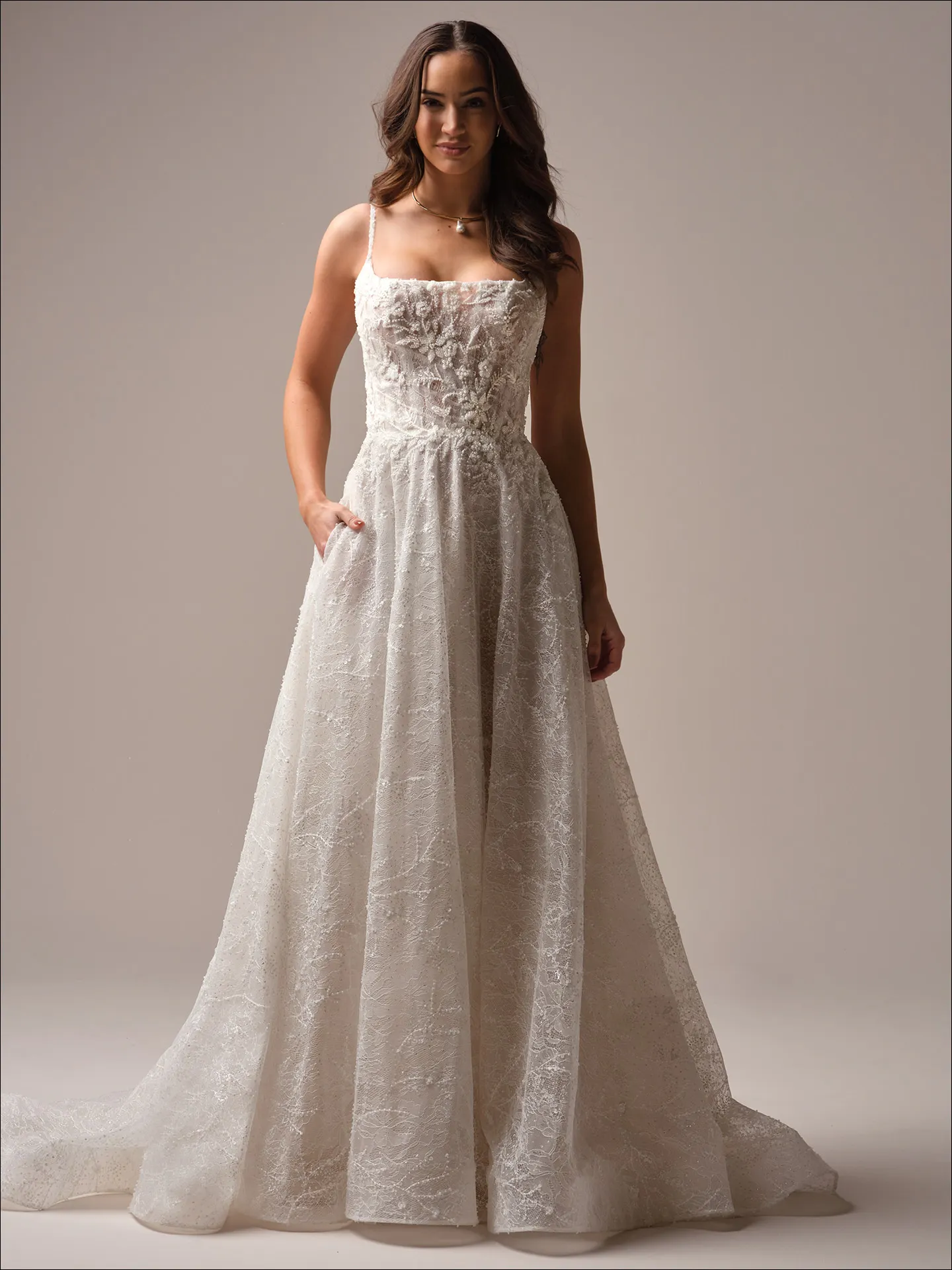 Maggie Sottero Salvadora A line wedding dress back view with long train