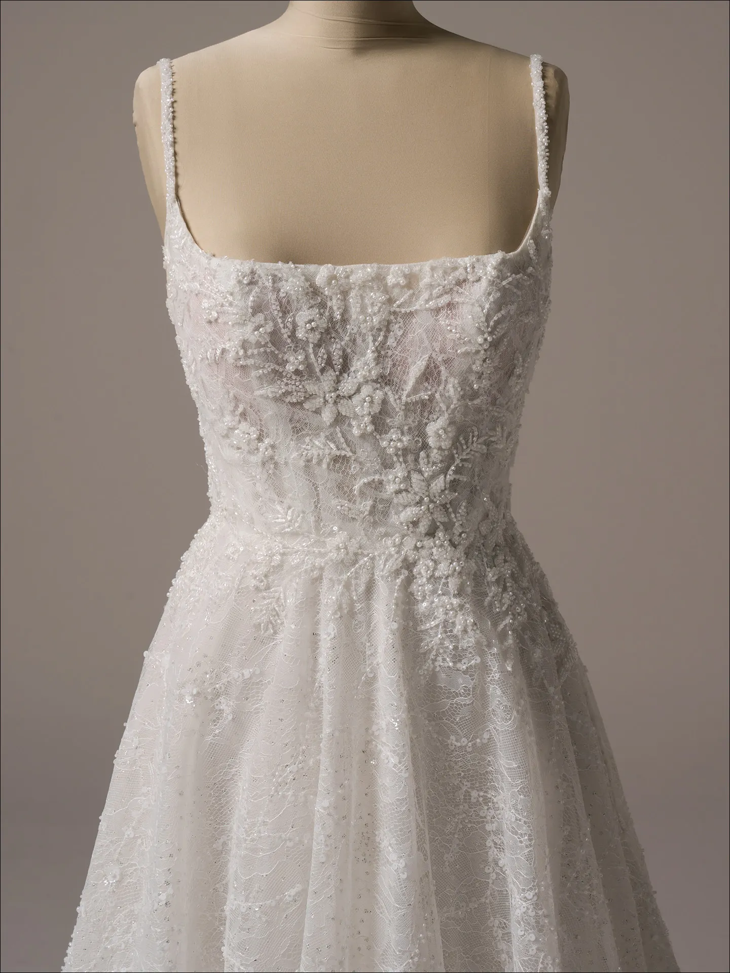 Maggie Sottero Salvadora A line wedding dress front view in soft ivory lace