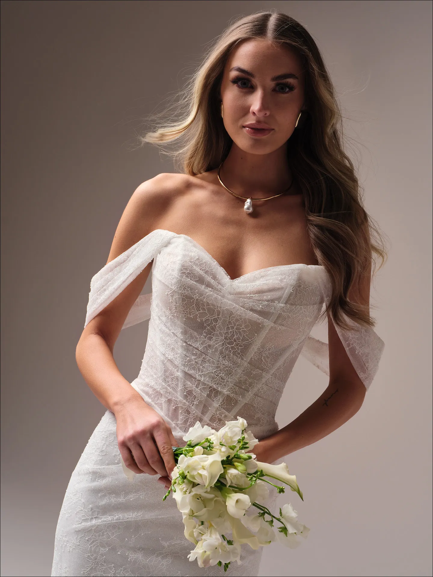 Maggie Sottero Sasha sheath wedding dress side view with sleek contour