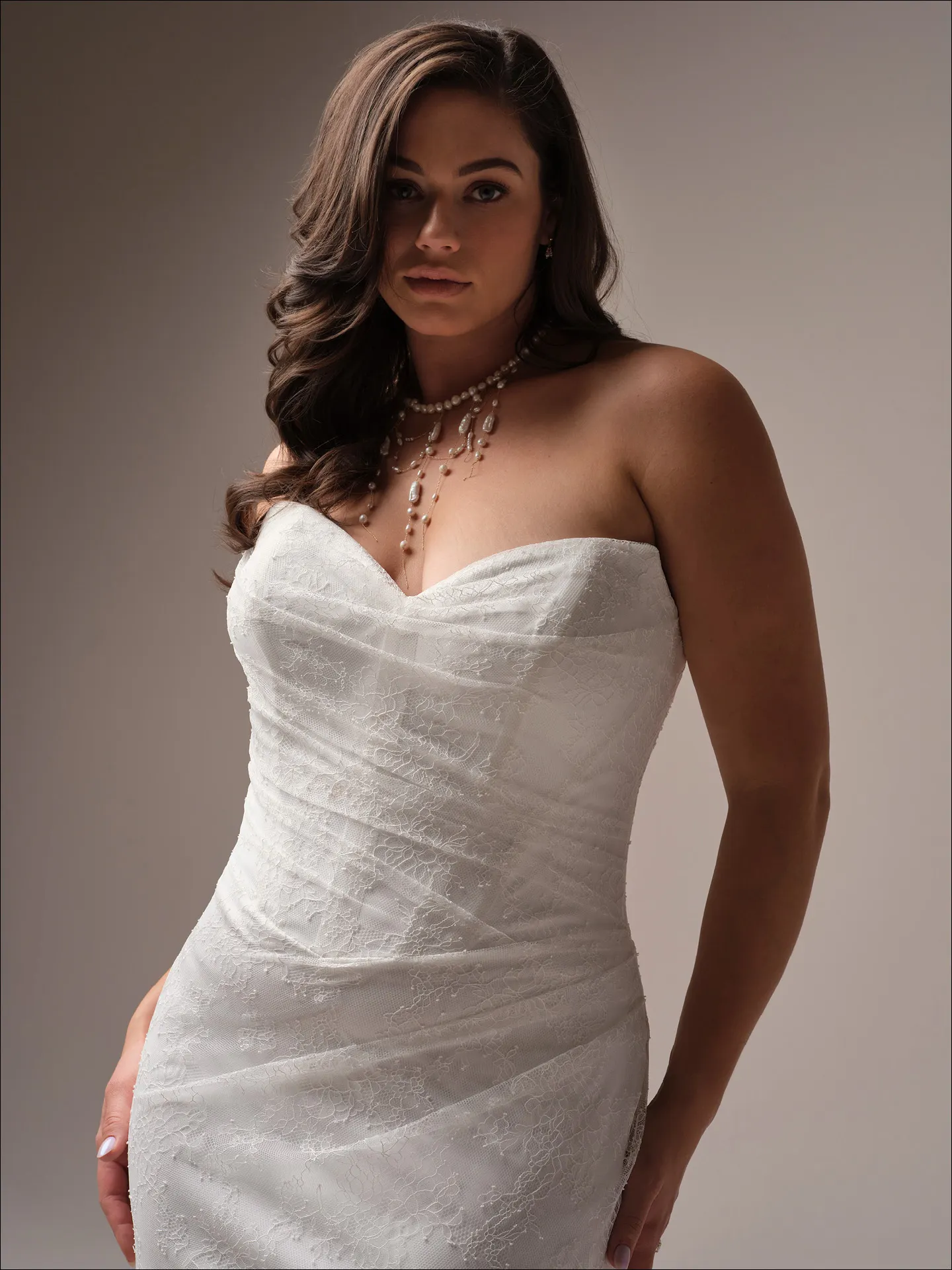 Maggie Sottero Sasha sheath wedding dress side view curve with sleek contour