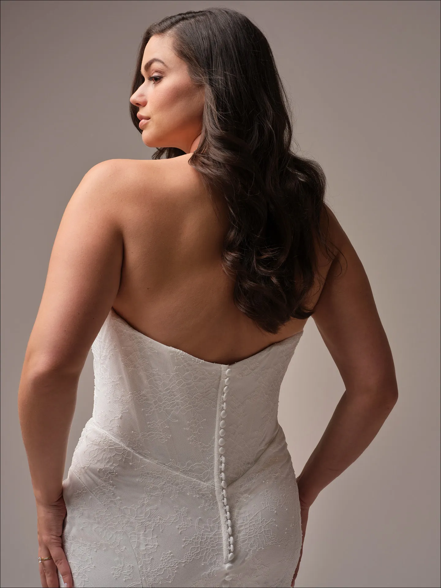 Maggie Sottero Sasha sheath wedding dress angled curve with sleek contour