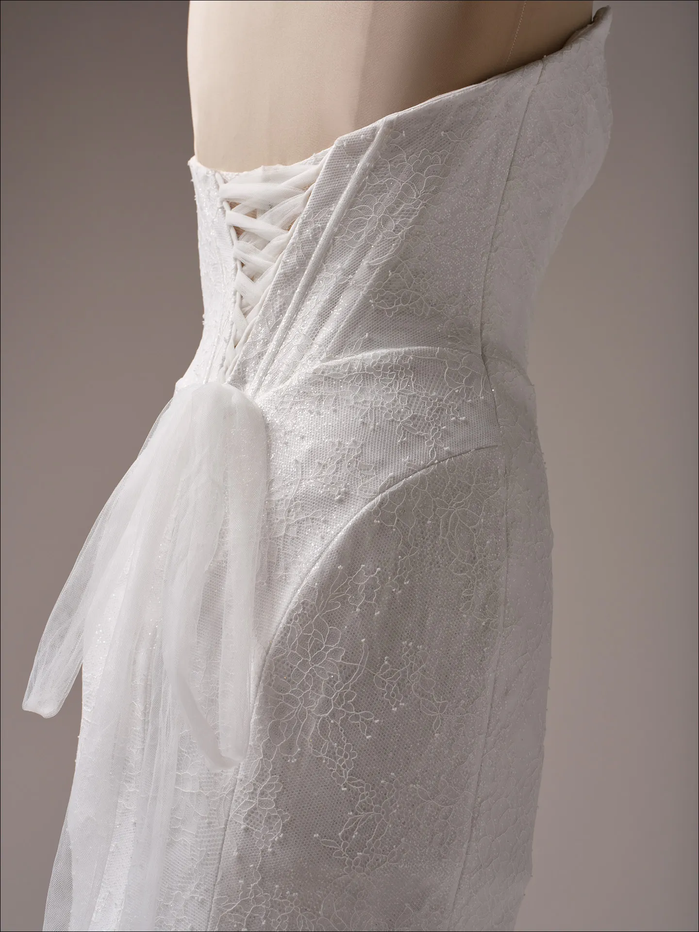 Maggie Sottero Sasha sheath wedding dress back view with extended train