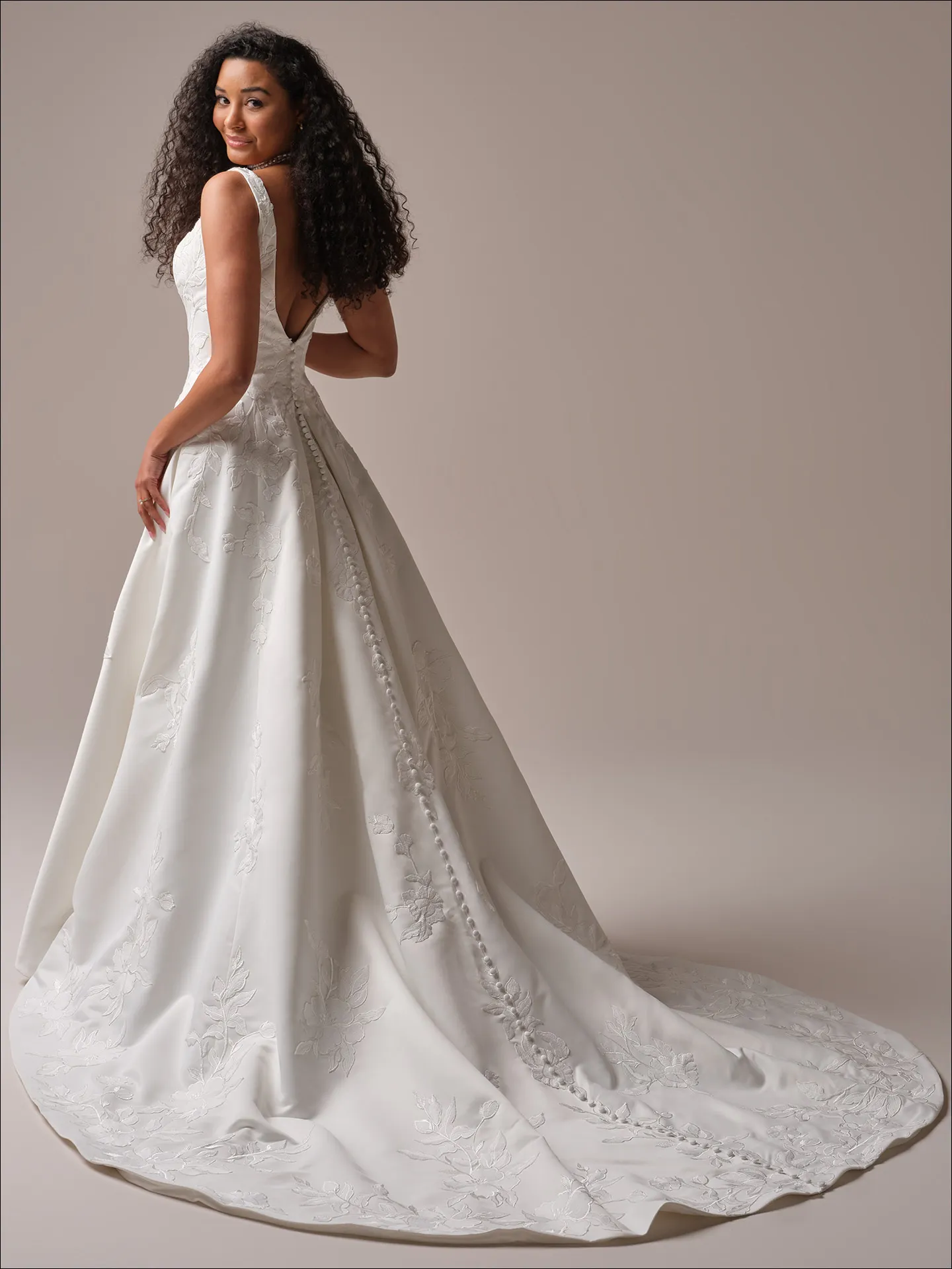 Maggie Sottero Sheridan A line wedding dress back view with long train