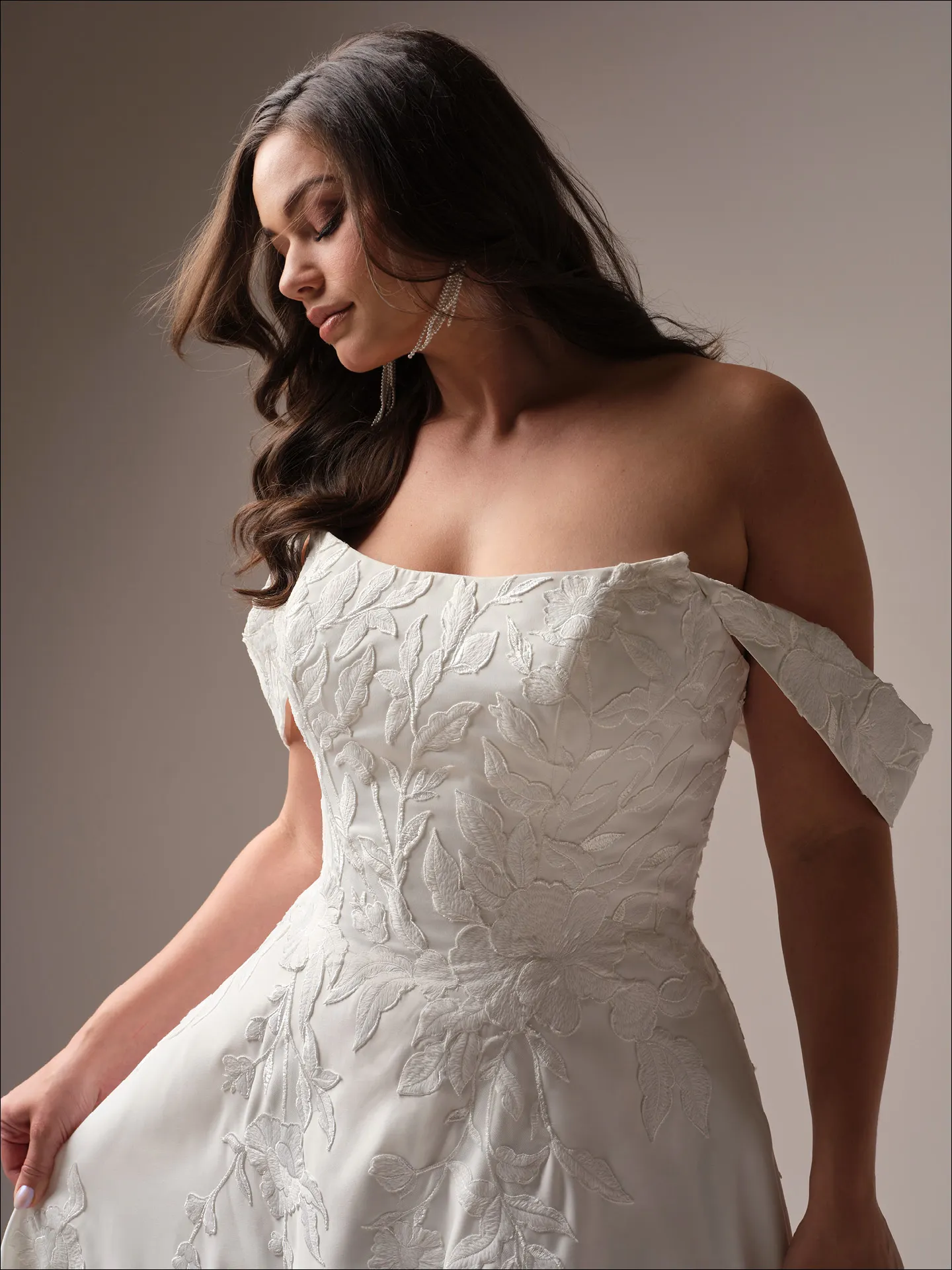Maggie Sottero Sheridan A line wedding dress angled curve with fitted bodice