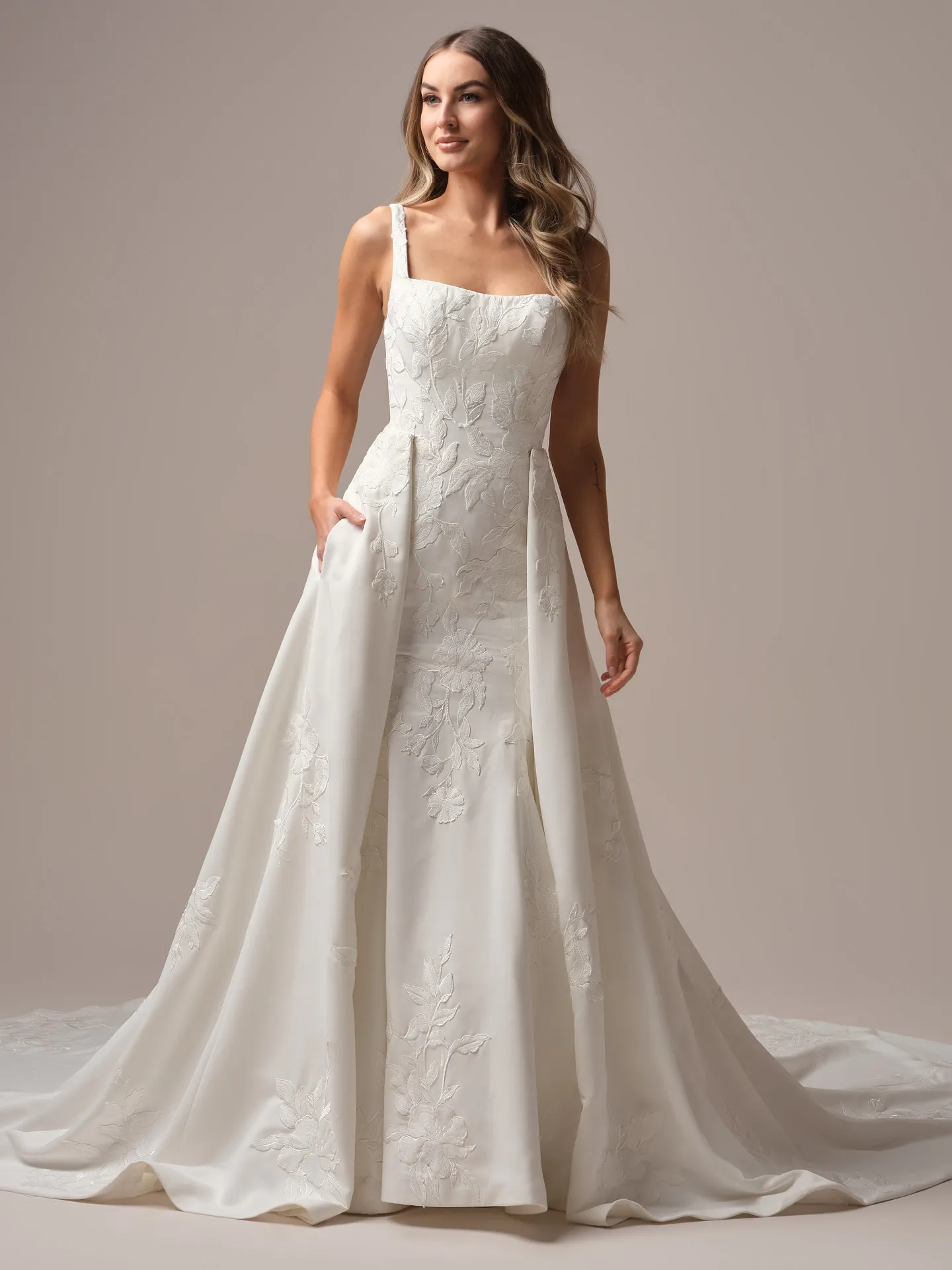 Maggie Sottero Sheridan Lane fit and flare wedding dress back view with lace train
