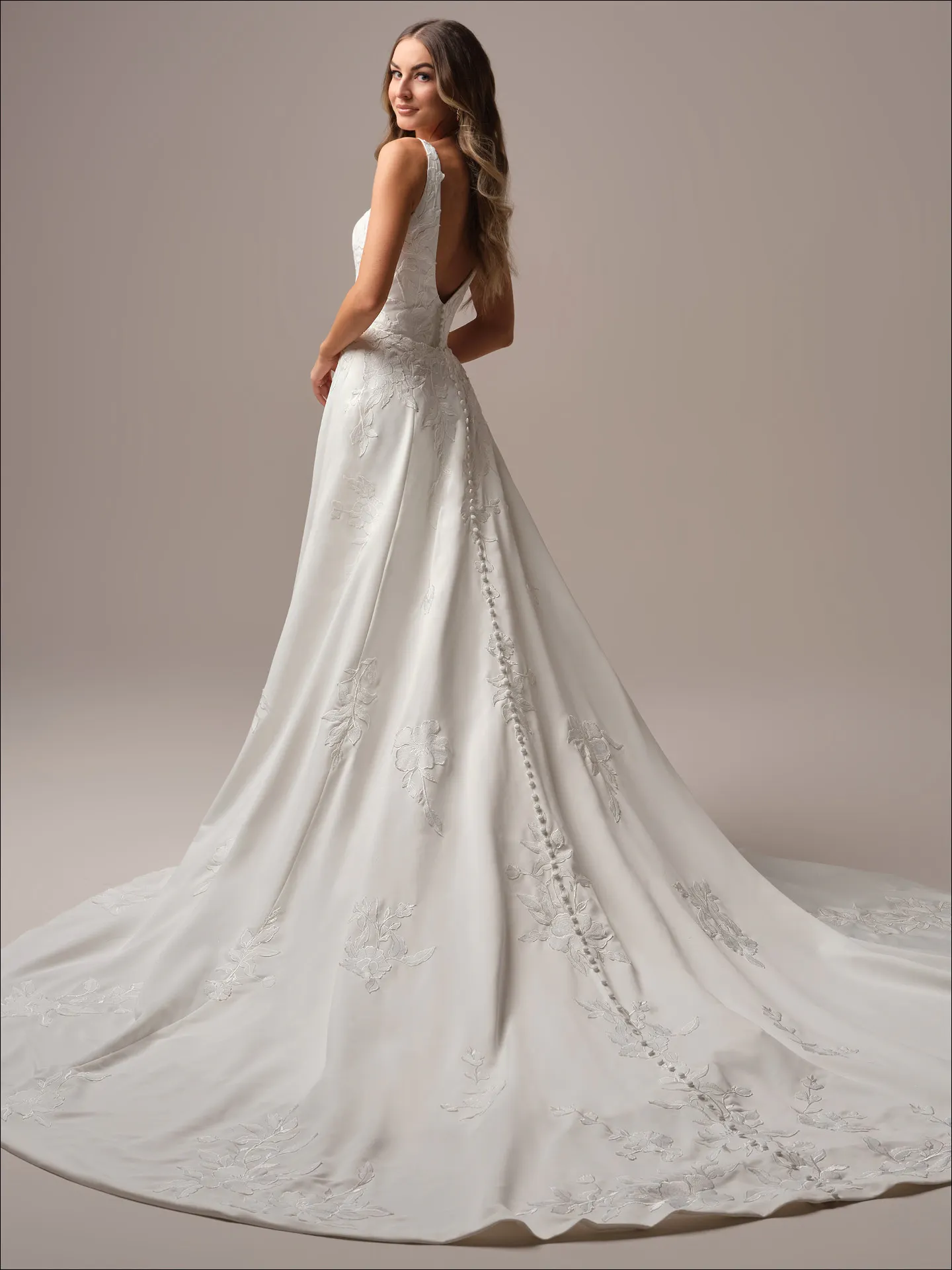 Maggie Sottero Sheridan Lane fit and flare wedding dress side angle with contoured fit