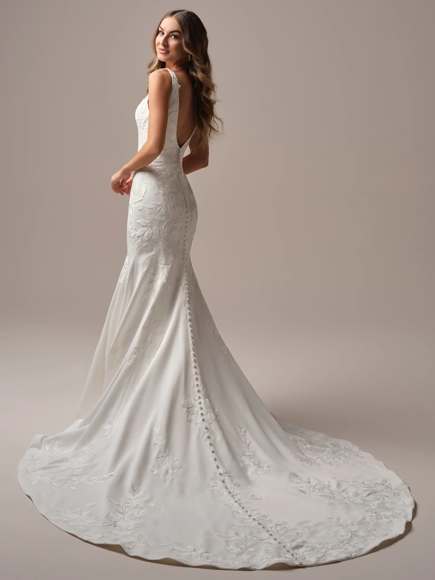 Maggie Sottero Sheridan Lane fit and flare wedding dress back view with extended train