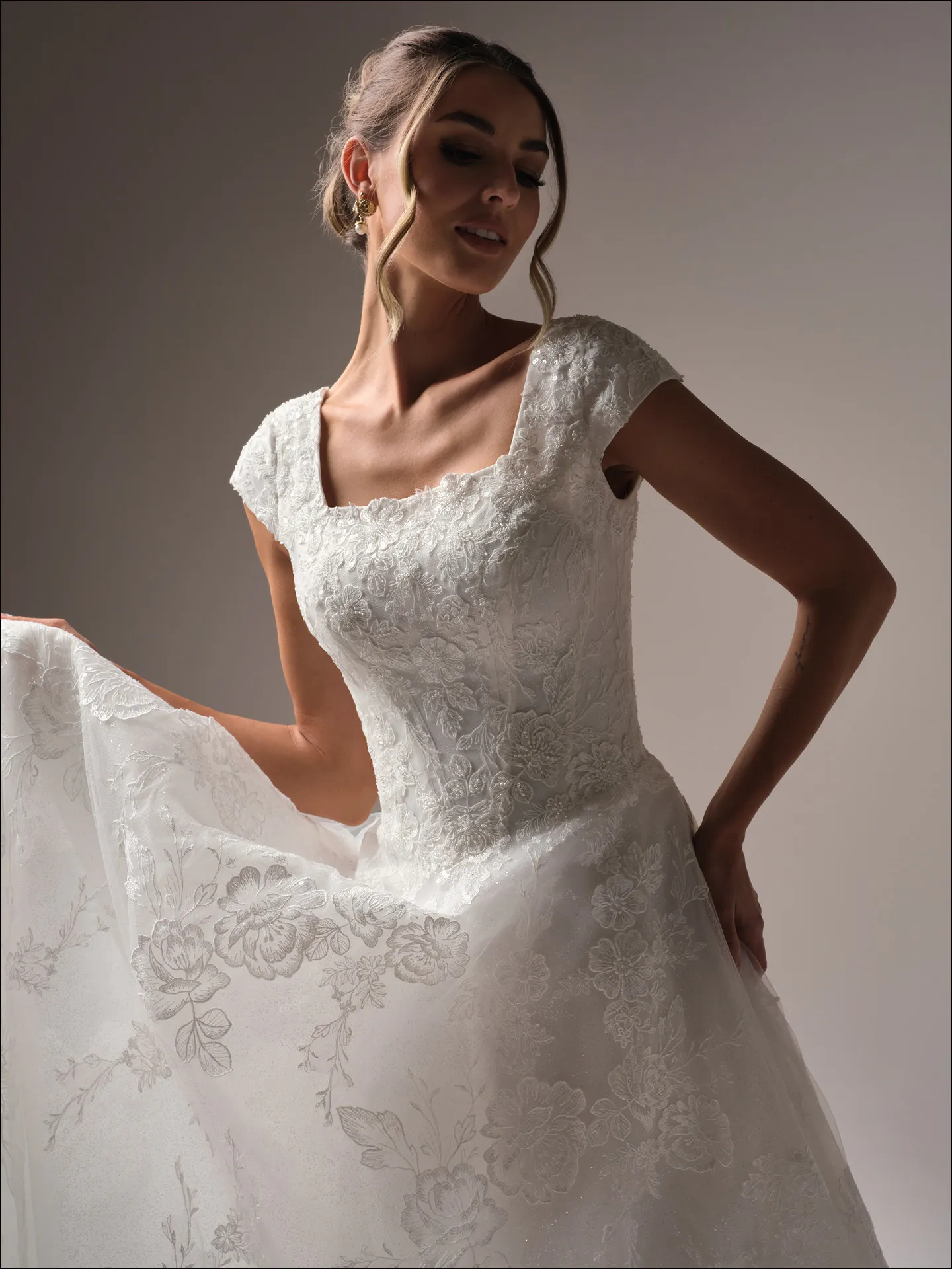 Maggie Sottero Skylar Leigh ballgown wedding dress side view with voluminous skirt