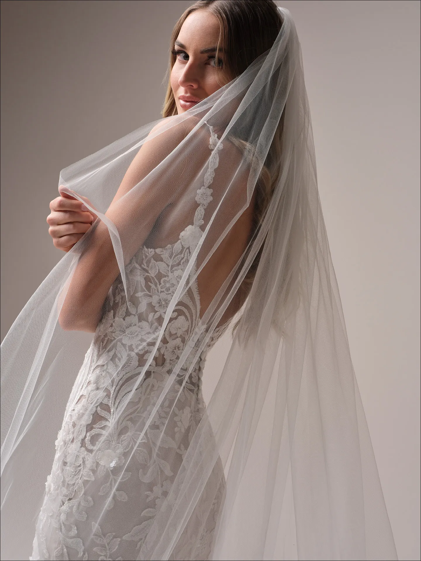 Maggie Sottero Sonoma fit and flare wedding dress side profile with lace detail