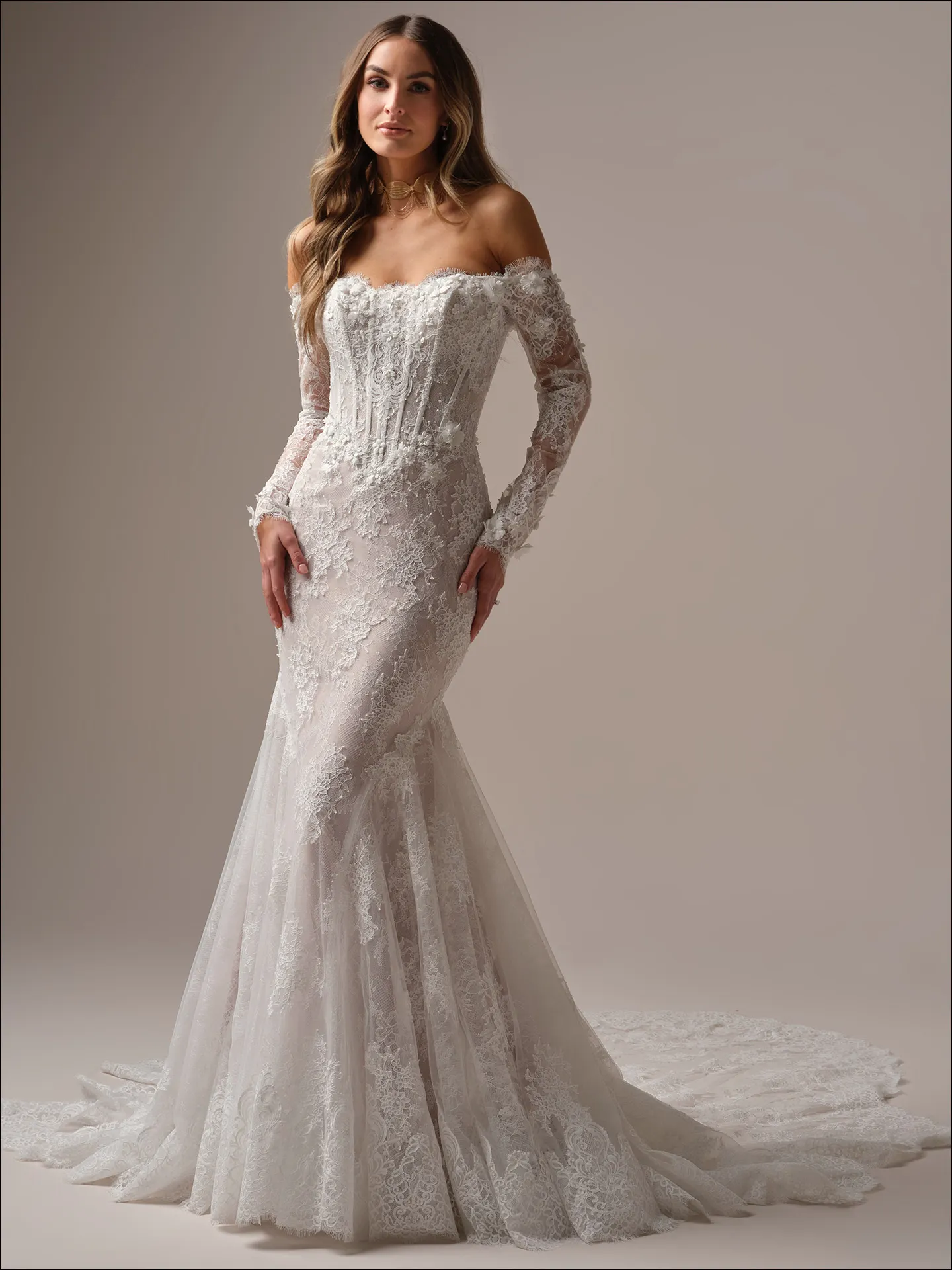 Maggie Sottero Takera fit and flare wedding dress back view with lace train