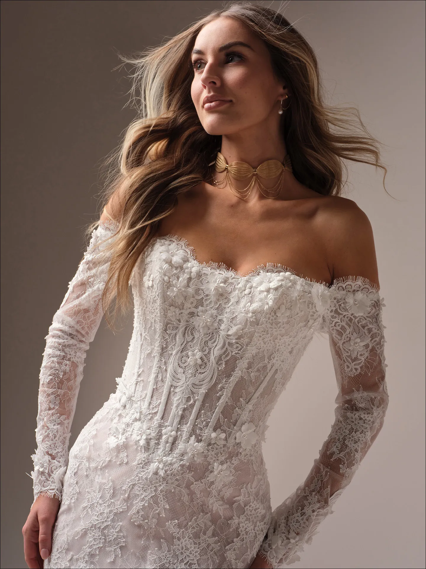 Maggie Sottero Takera fit and flare wedding dress side angle with contoured fit