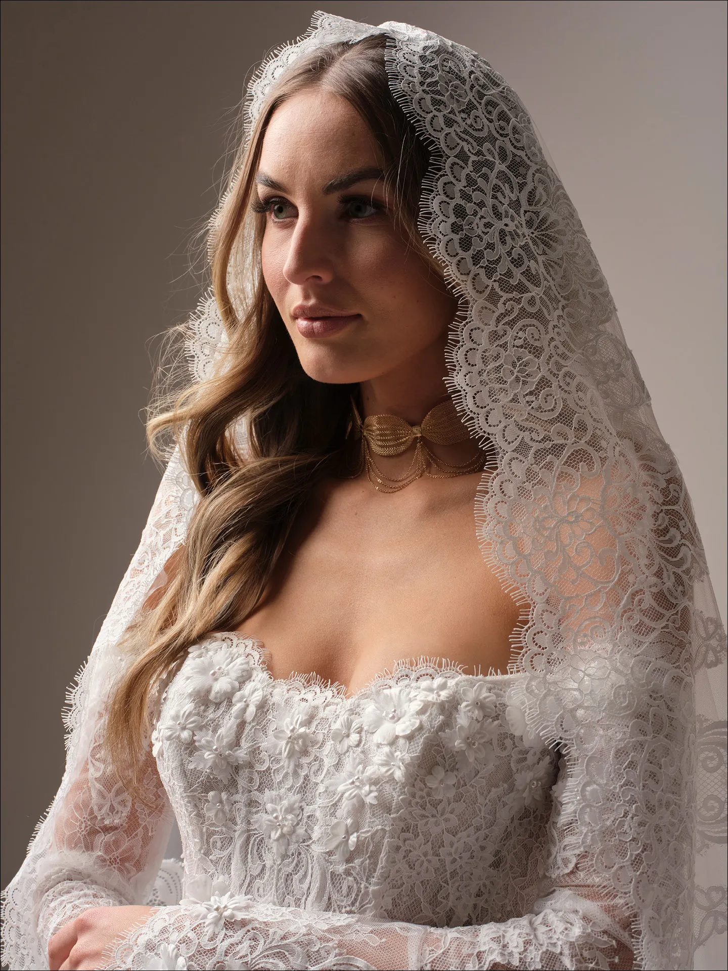 Maggie Sottero Takera fit and flare wedding dress side angle with sculpted silhouette