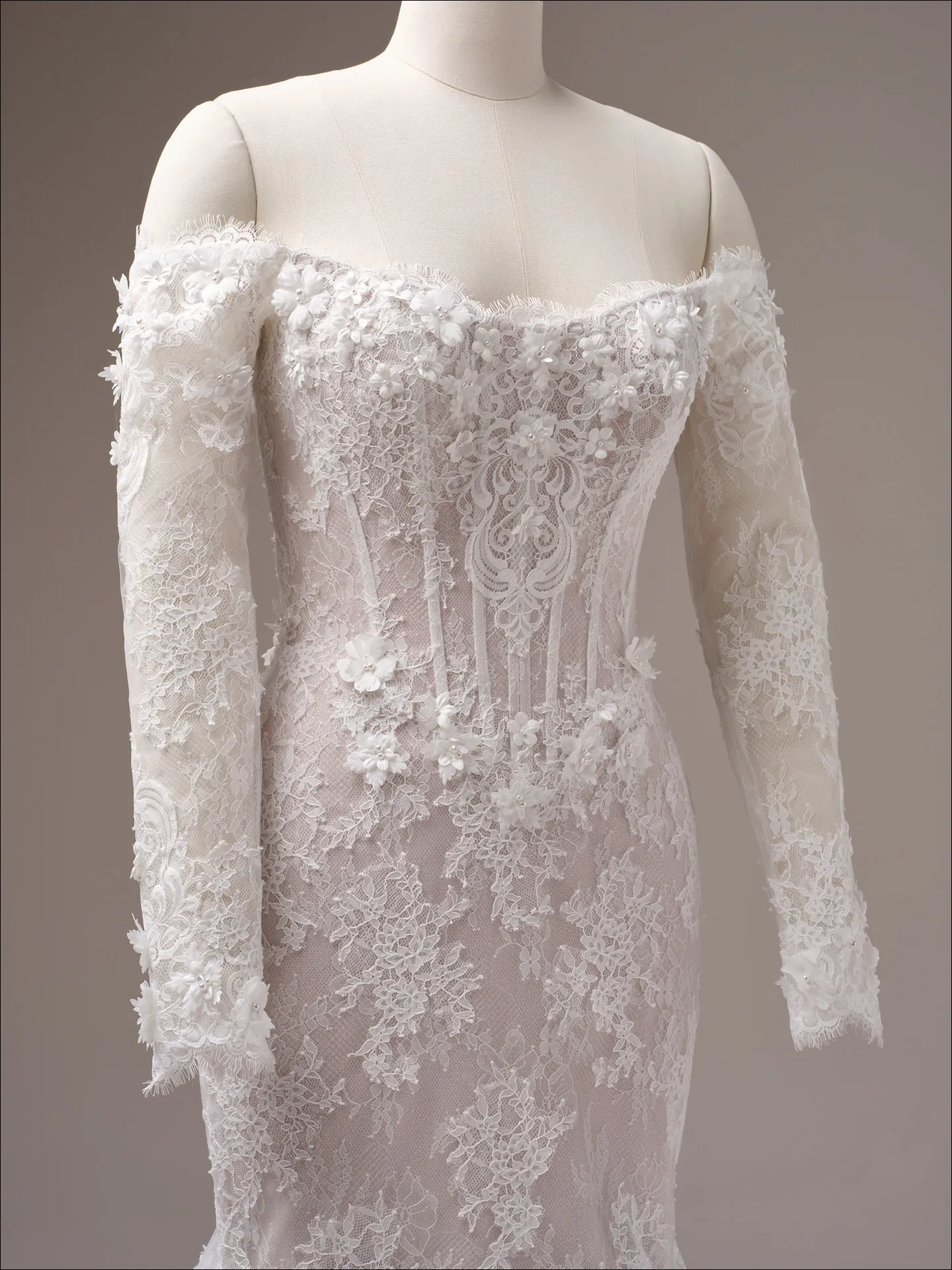 Maggie Sottero Takera fit and flare wedding dress back view with lace train