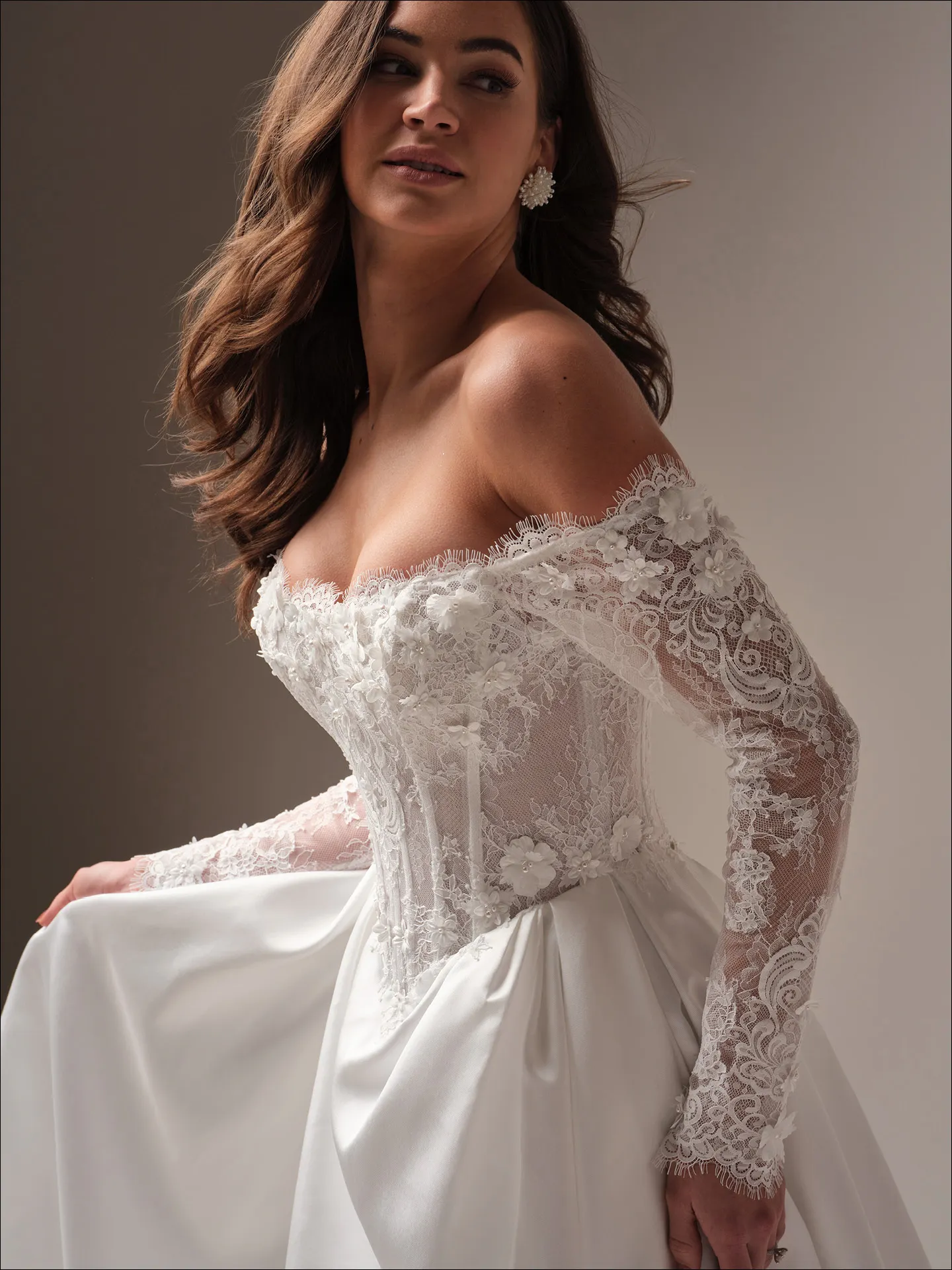 Maggie Sottero Takera Lane A line wedding dress side view with flowing skirt