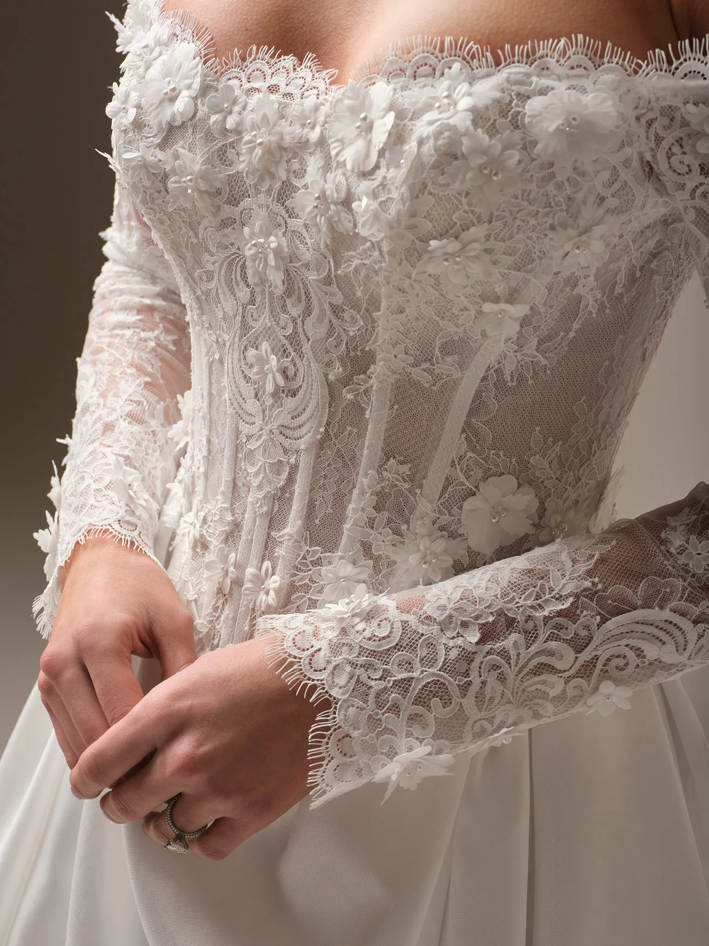 Maggie Sottero Takera Lane A line wedding dress back view with long train