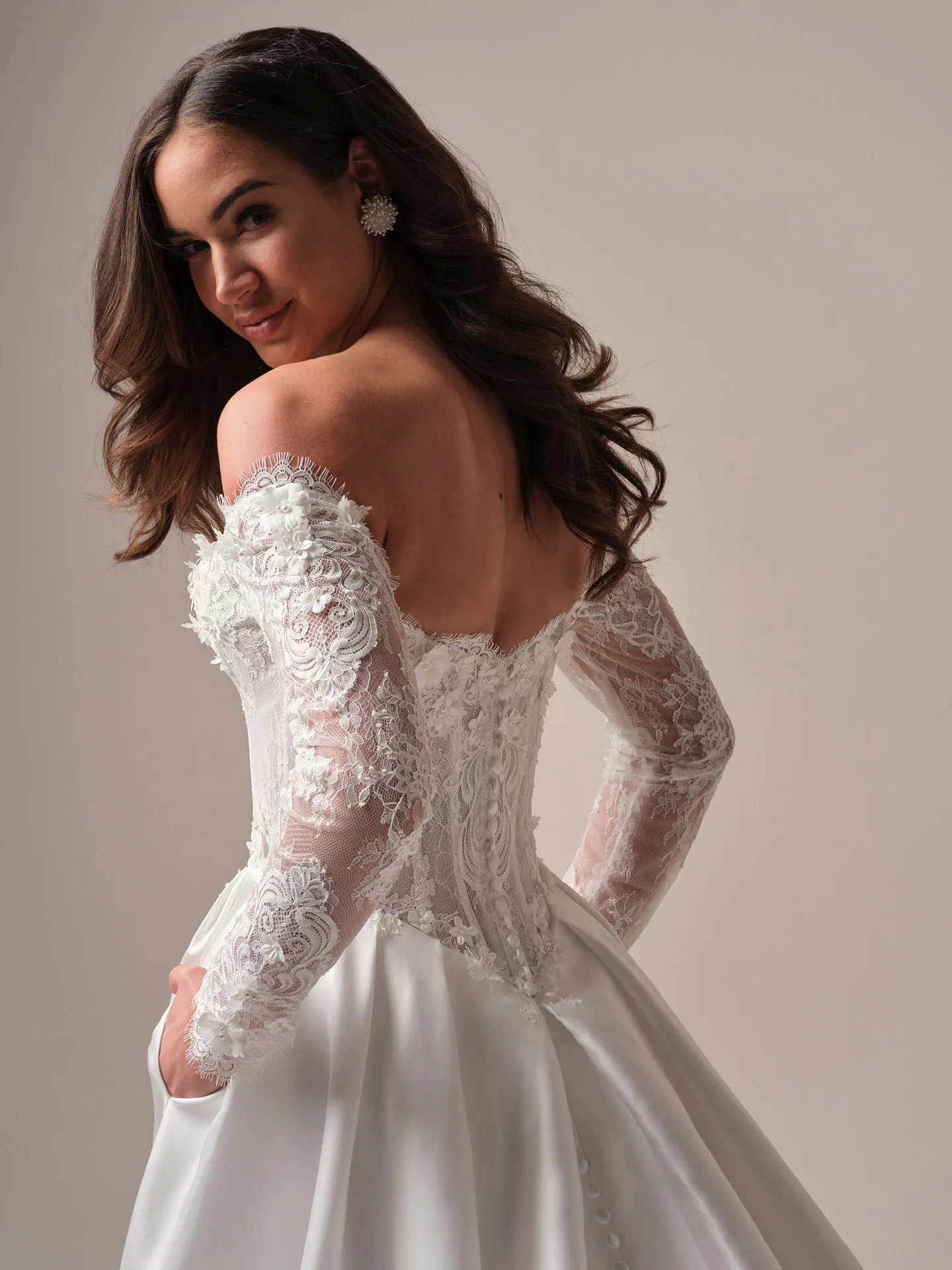 Maggie Sottero Takera Lane A line wedding dress back angle with extended train