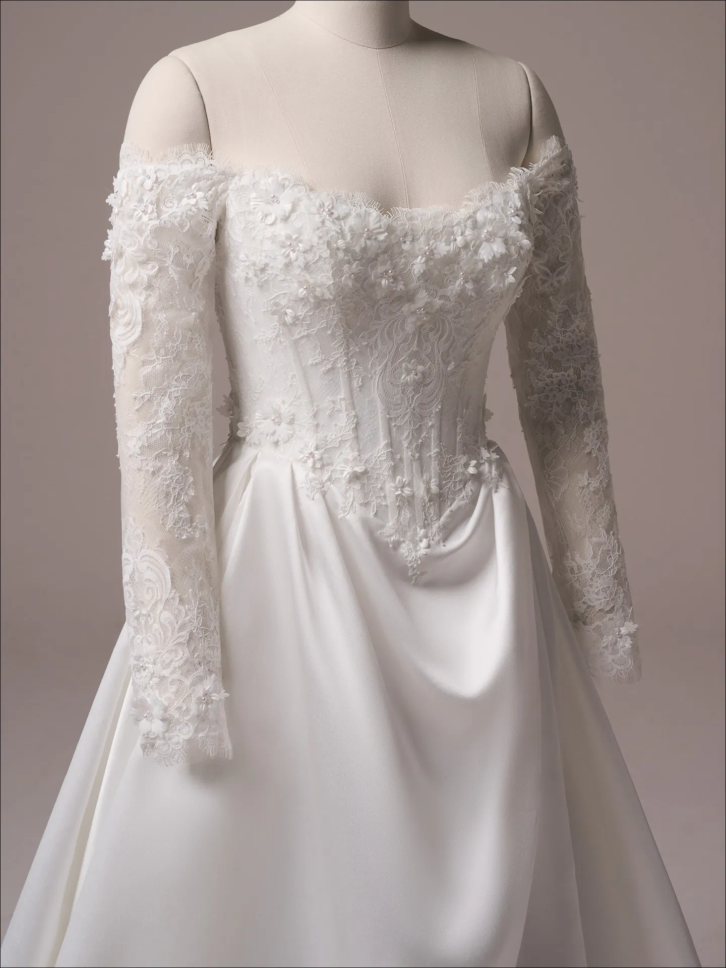 Maggie Sottero Takera Lane fit and flare wedding dress side view with fitted silhouette