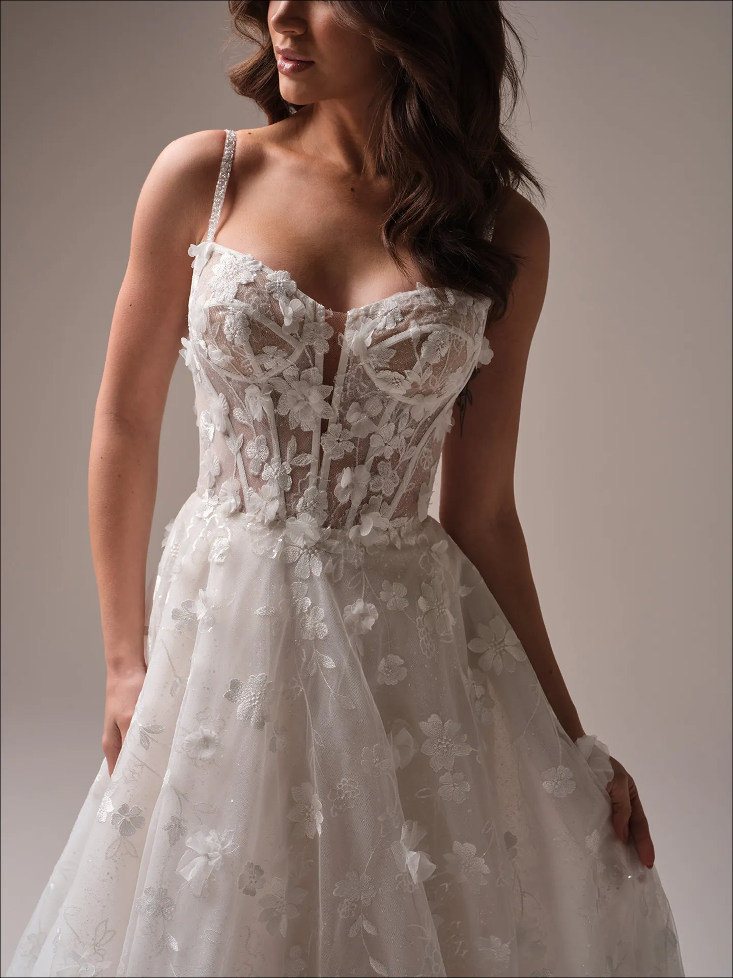 Maggie Sottero Wallis ballgown wedding dress side view with voluminous skirt