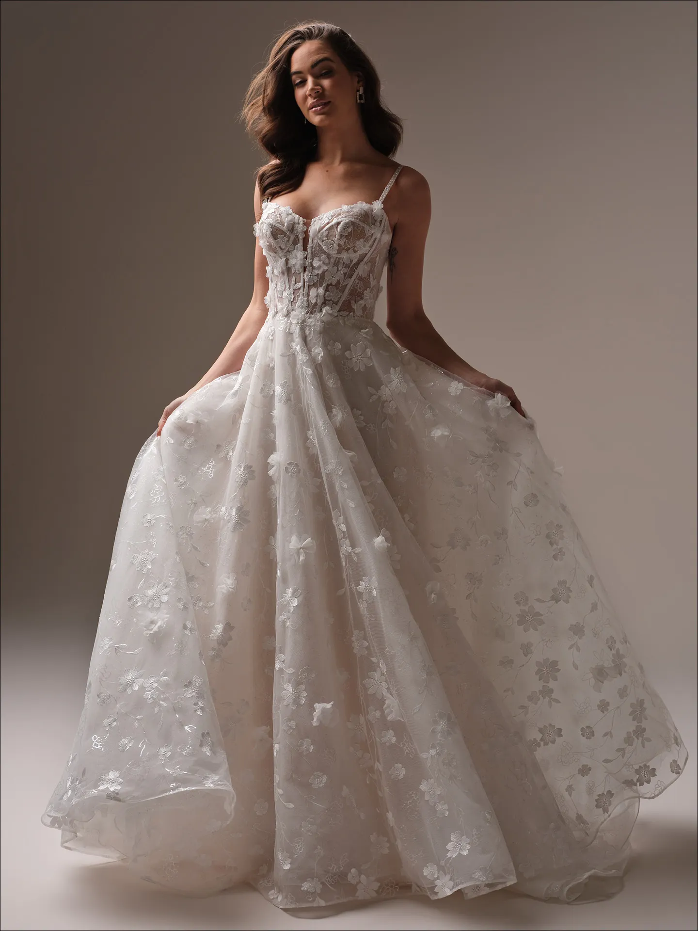 Maggie Sottero Wallis ballgown wedding dress back view with long train