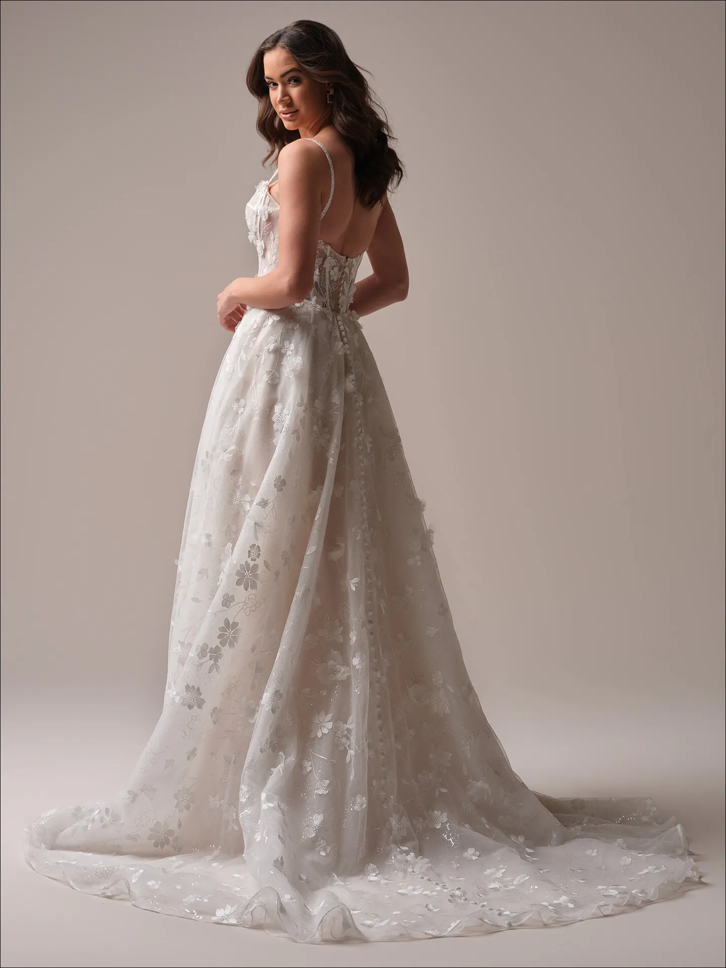 Maggie Sottero Wallis ballgown wedding dress side angle with layered skirt