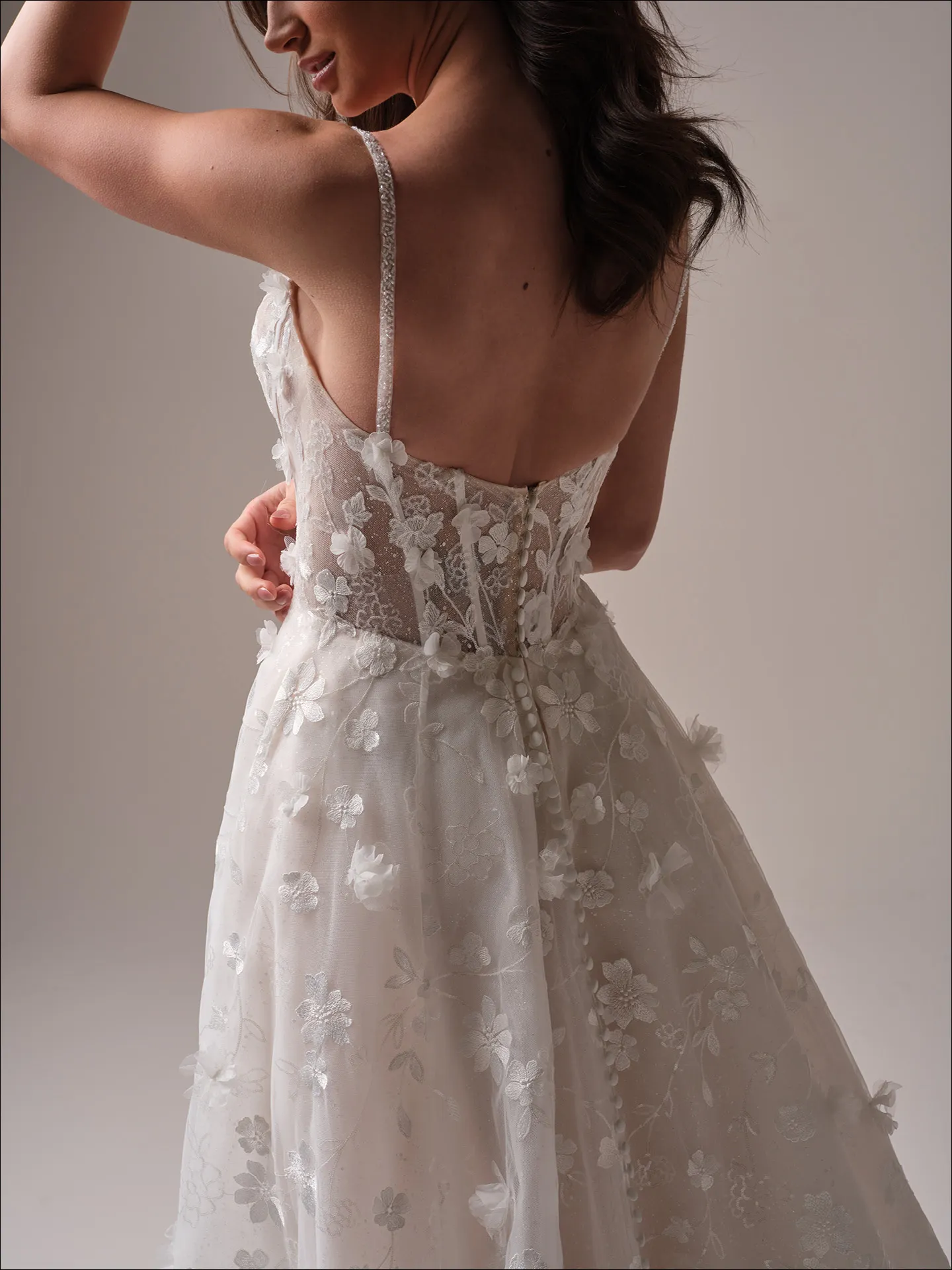 Maggie Sottero Wallis ballgown wedding dress back angle with extended train