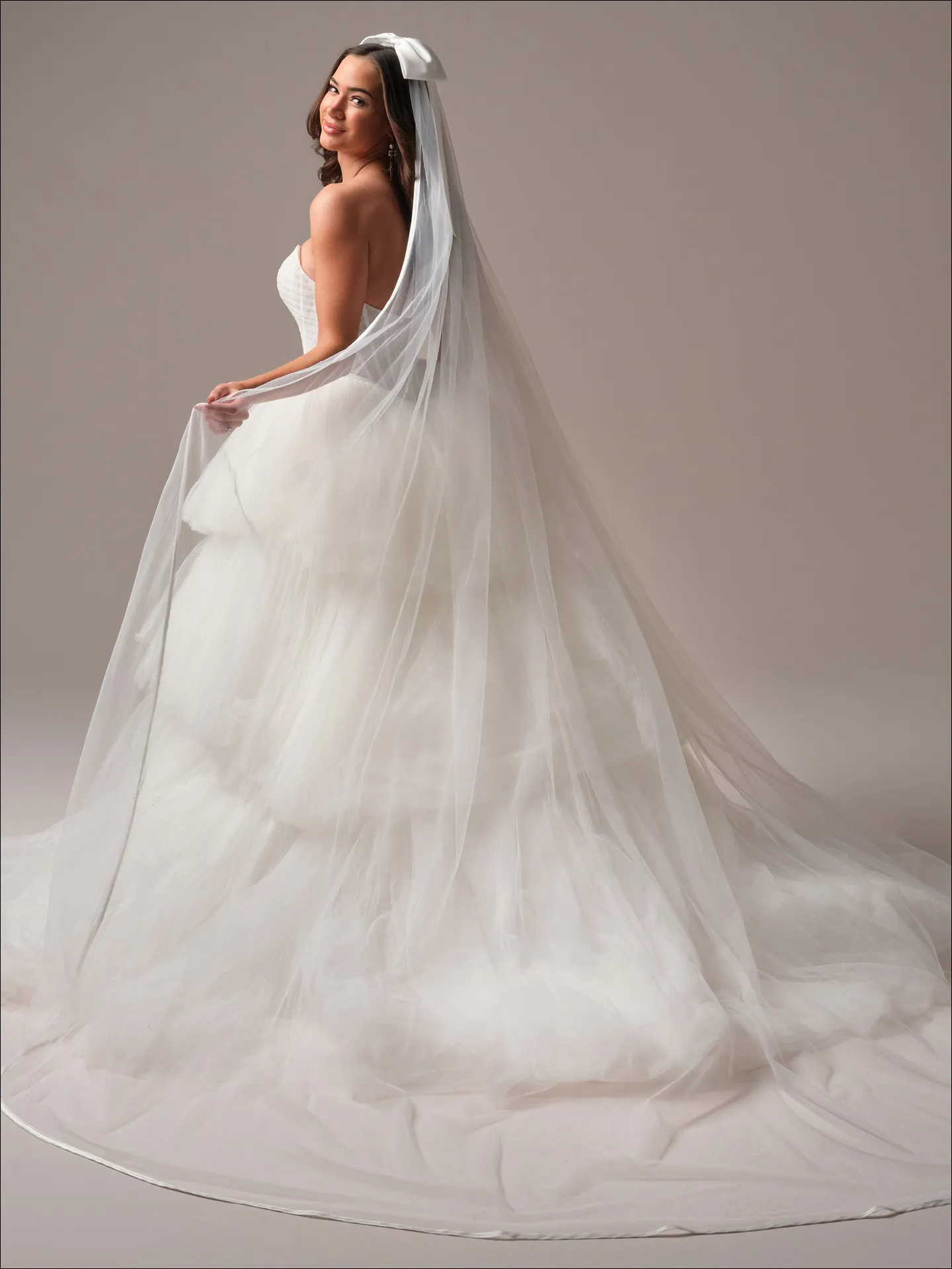 Maggie Sottero Yurianna ballgown wedding dress back view with sweeping train