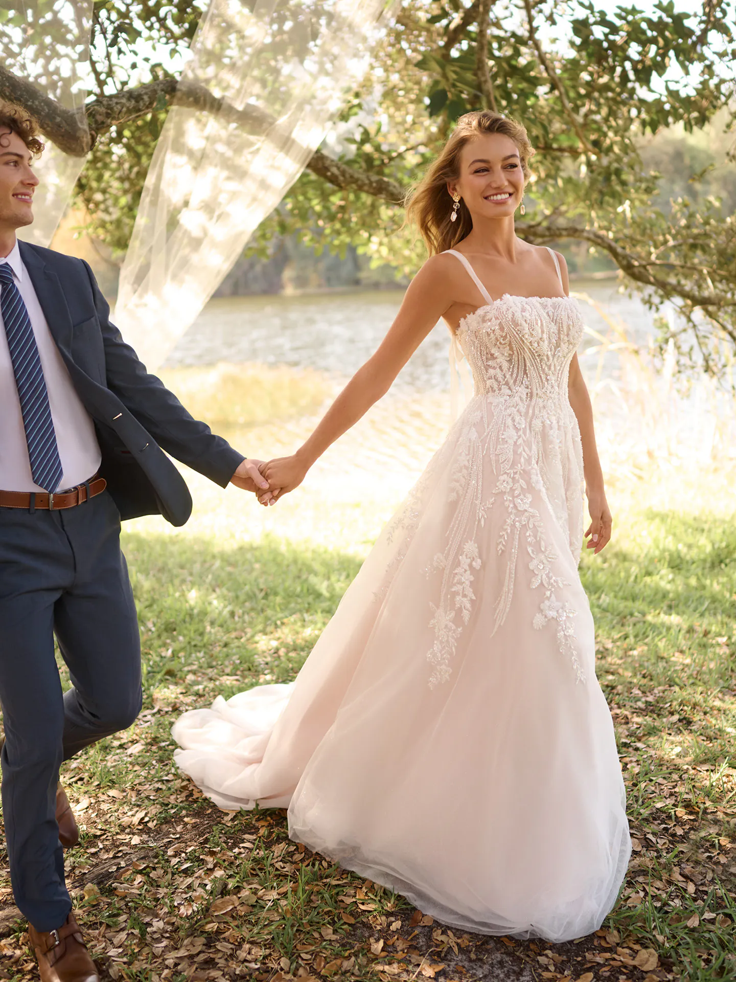 Rebecca Ingram Angie beaded A-line gown, woman outdoors, front view