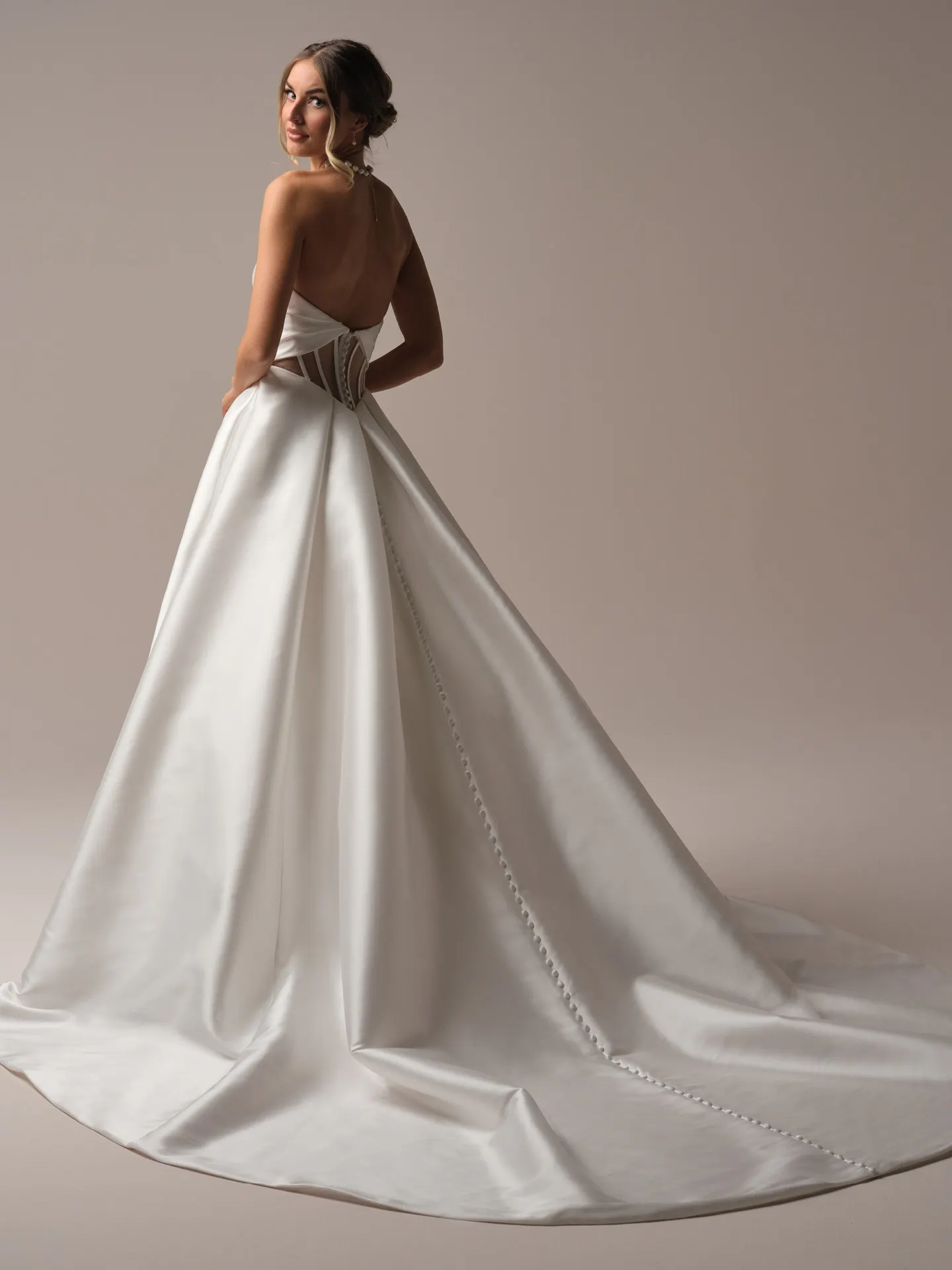 Rebecca Ingram Brooke back view A-line Mikado gown with tie bodice.