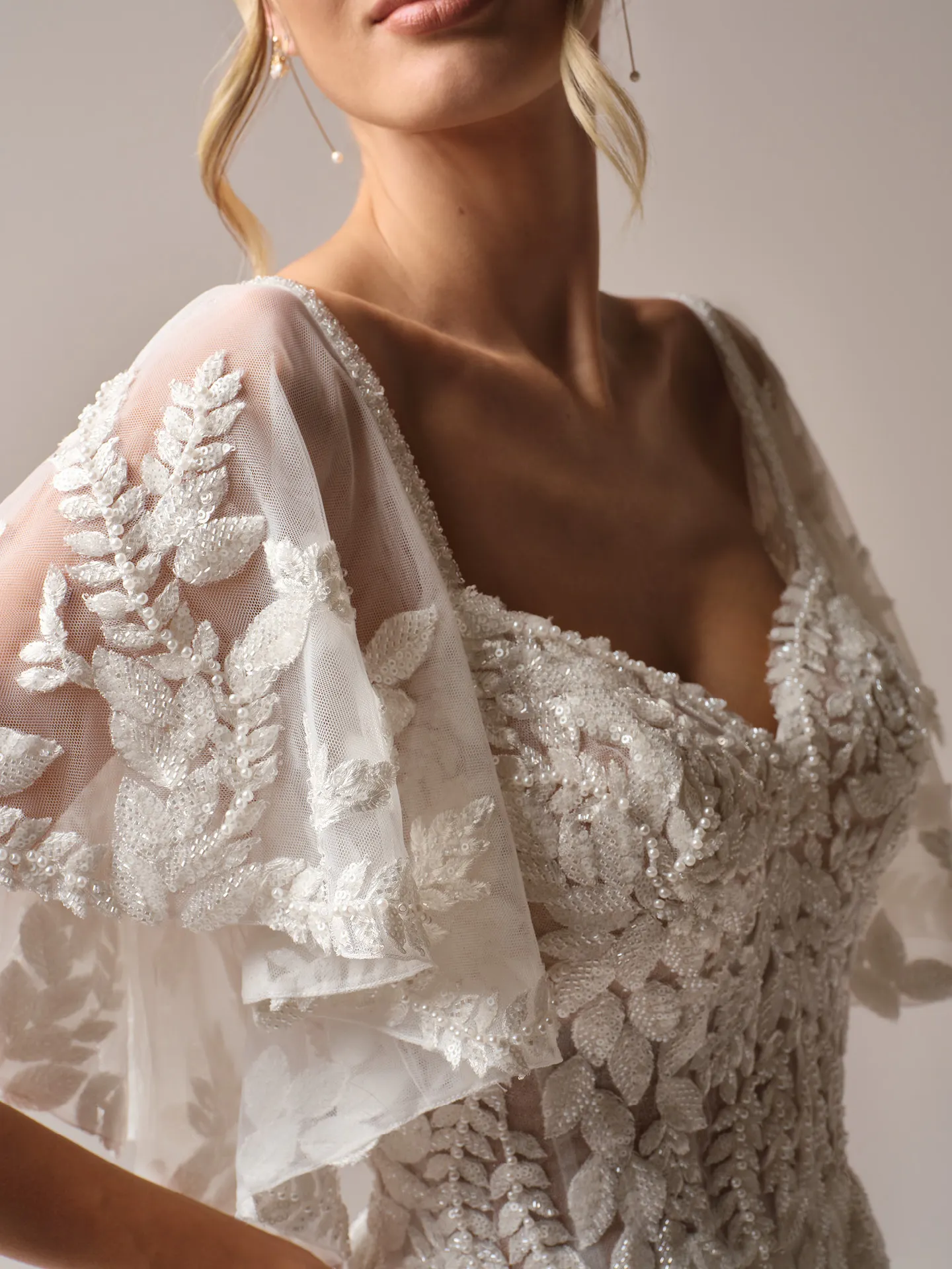 Rebecca Ingram Carmen close view, floral lace and beading detail, V-neck, spaghetti strap gown