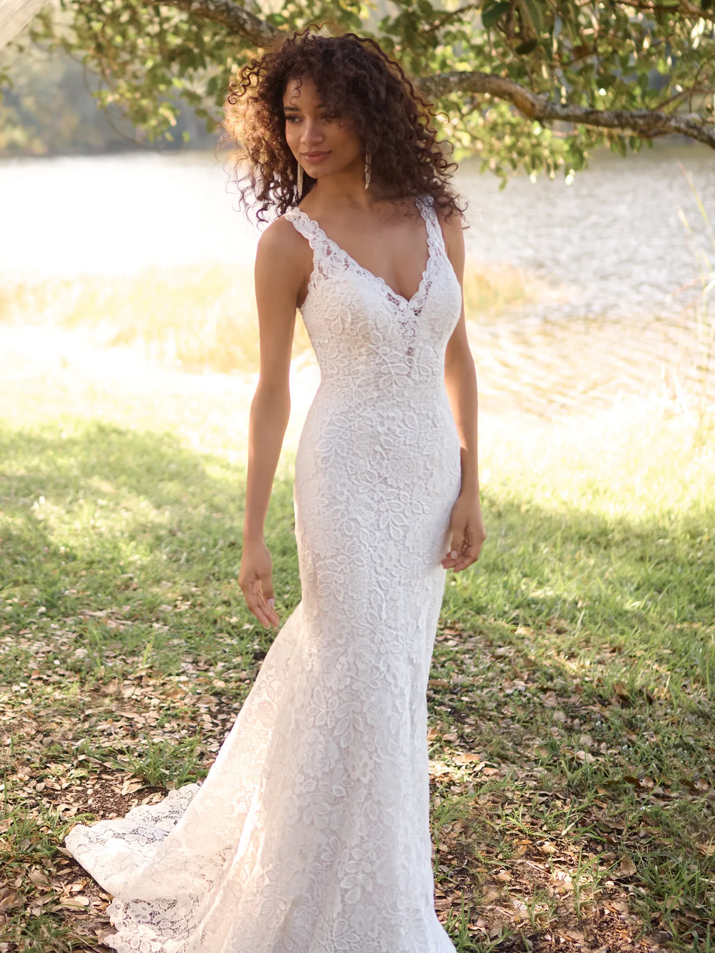 Rebecca Ingram Dayna lace mermaid wedding dress front view outdoors.