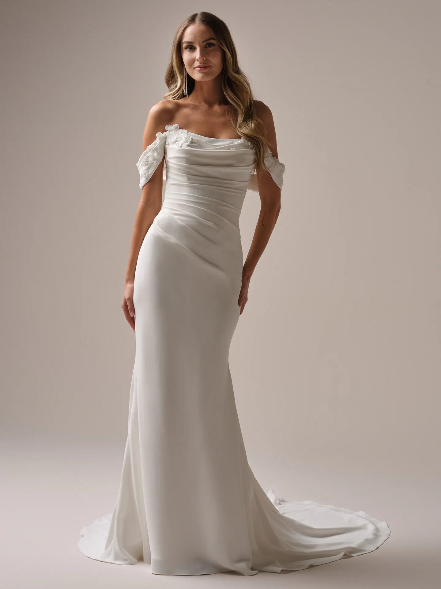 Rebecca Ingram Fantasia front view mermaid bridal dress with off-shoulder sleeves