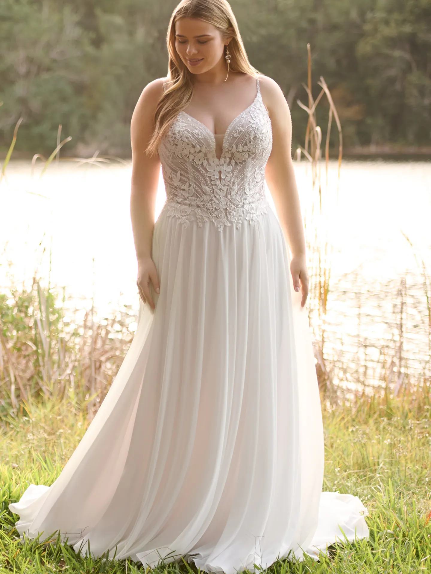 Rebecca Ingram Finley front view flowing A-line gown with plunge neckline.