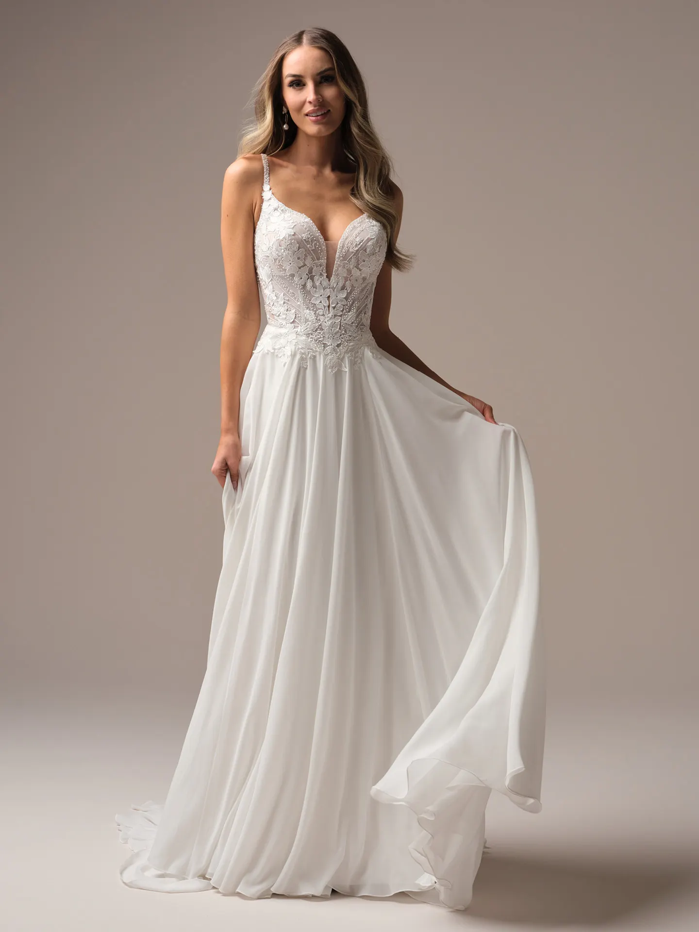 Rebecca Ingram Finley front view plunge neckline A-line bridal gown.