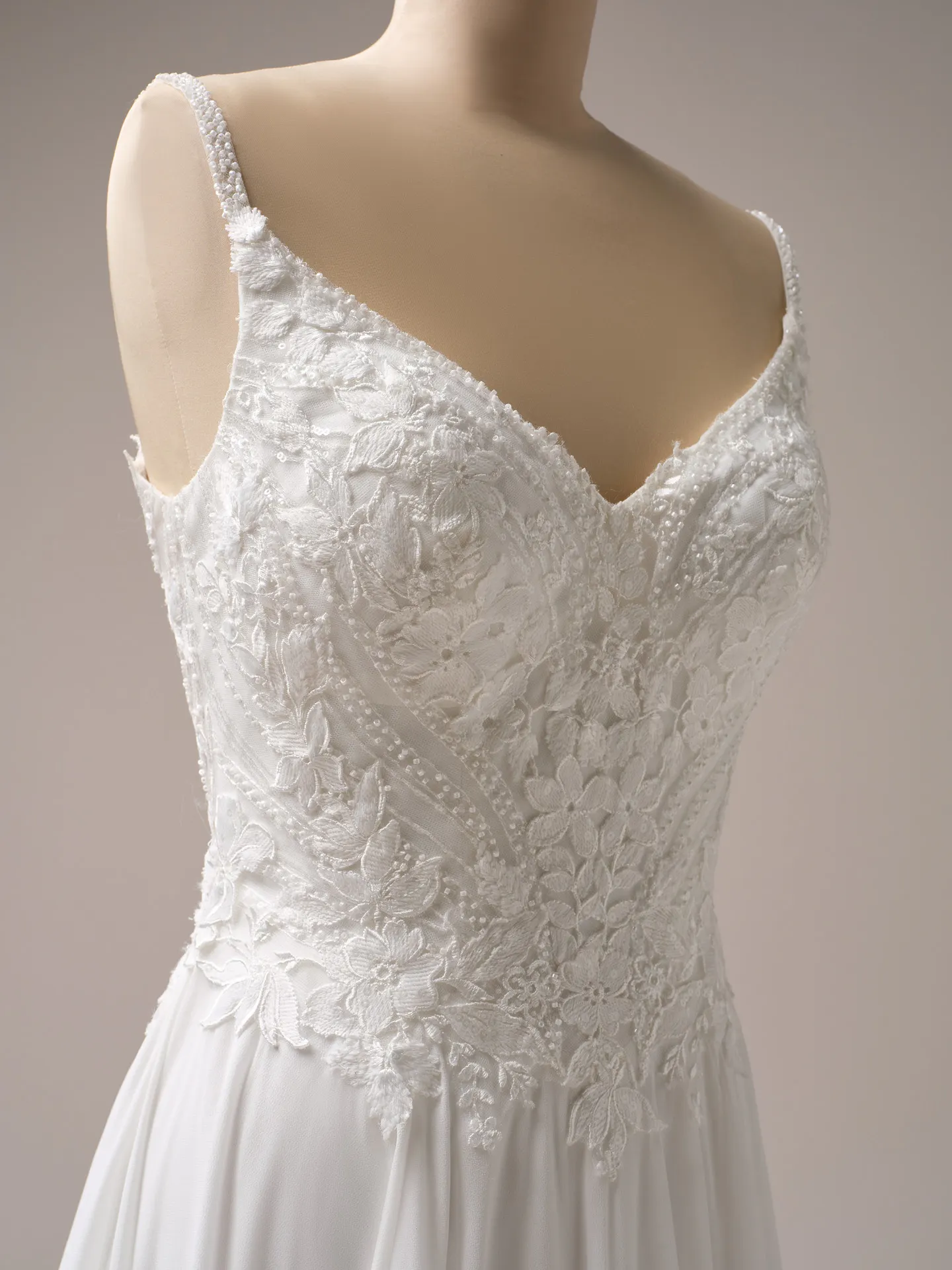 Rebecca Ingram Finley close-up, lace details, plunge neckline