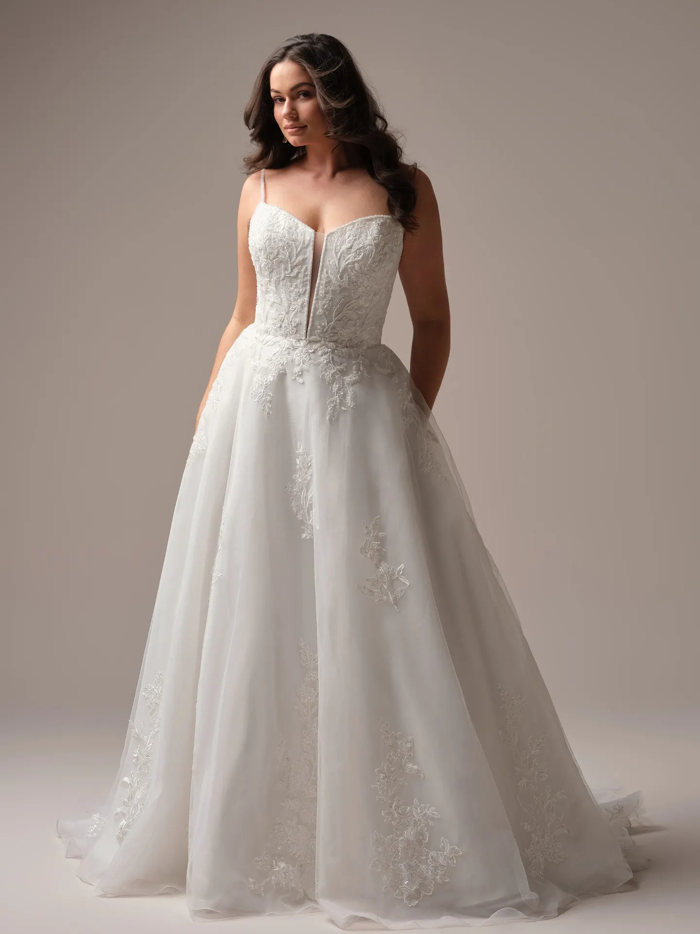 Rebecca Ingram Jude front view lace A-line wedding dress with floral details.
