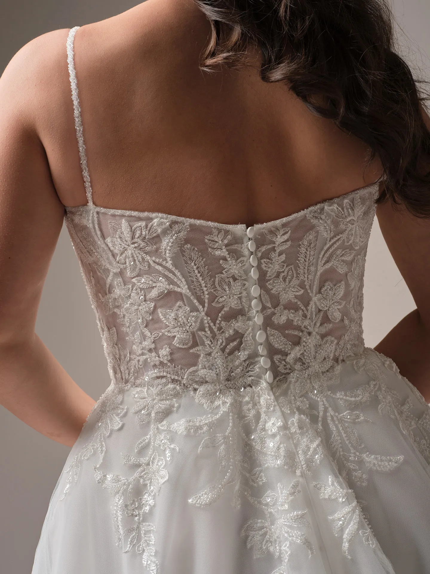 Rebecca Ingram Jude back view lace floral A-line gown with buttons
