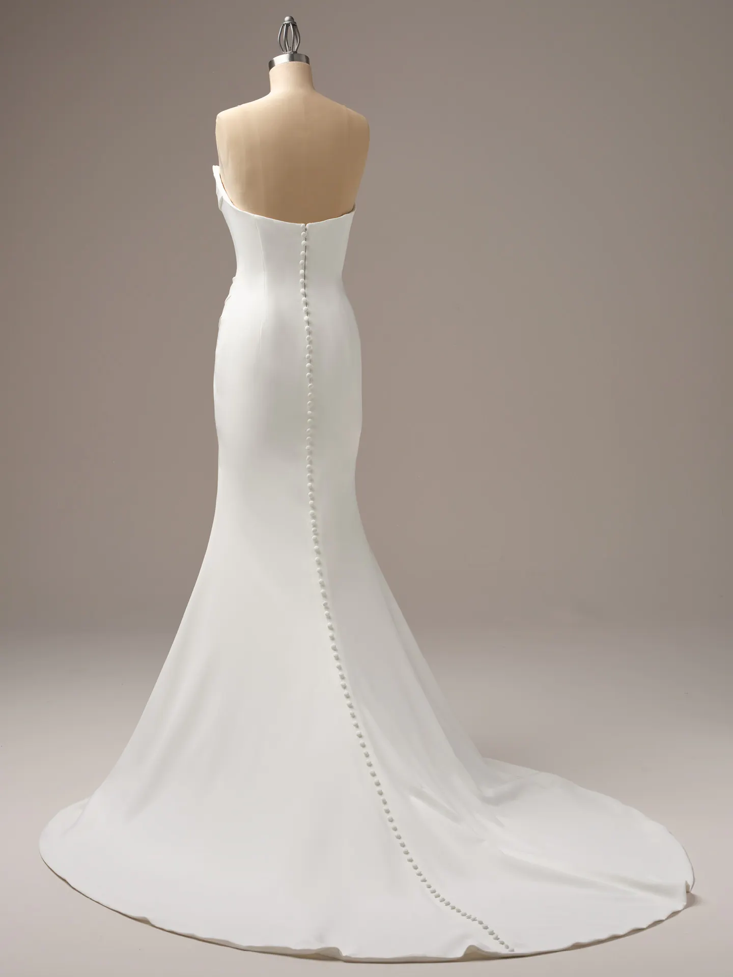 Maggie Sottero Kailani back view crepe wedding dress with button detail