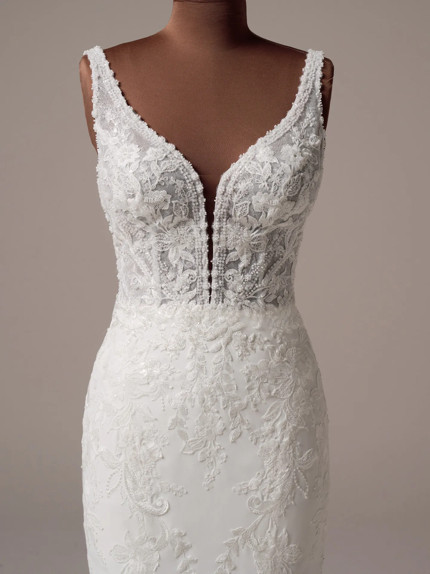 Rebecca Ingram Larissa front view, detailed lace fit-and-flare bridal gown.