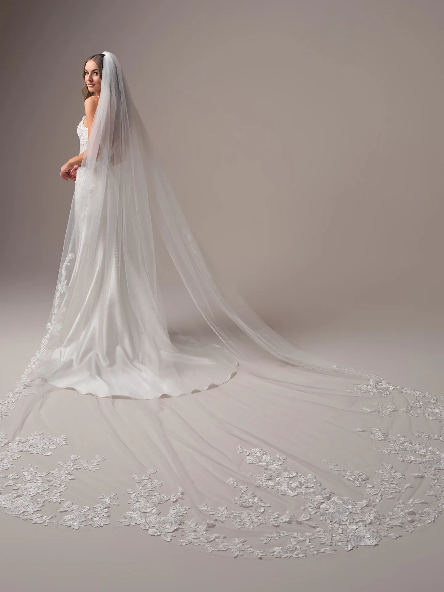 Rebecca Ingram mermaid gown side view with lace train and veil