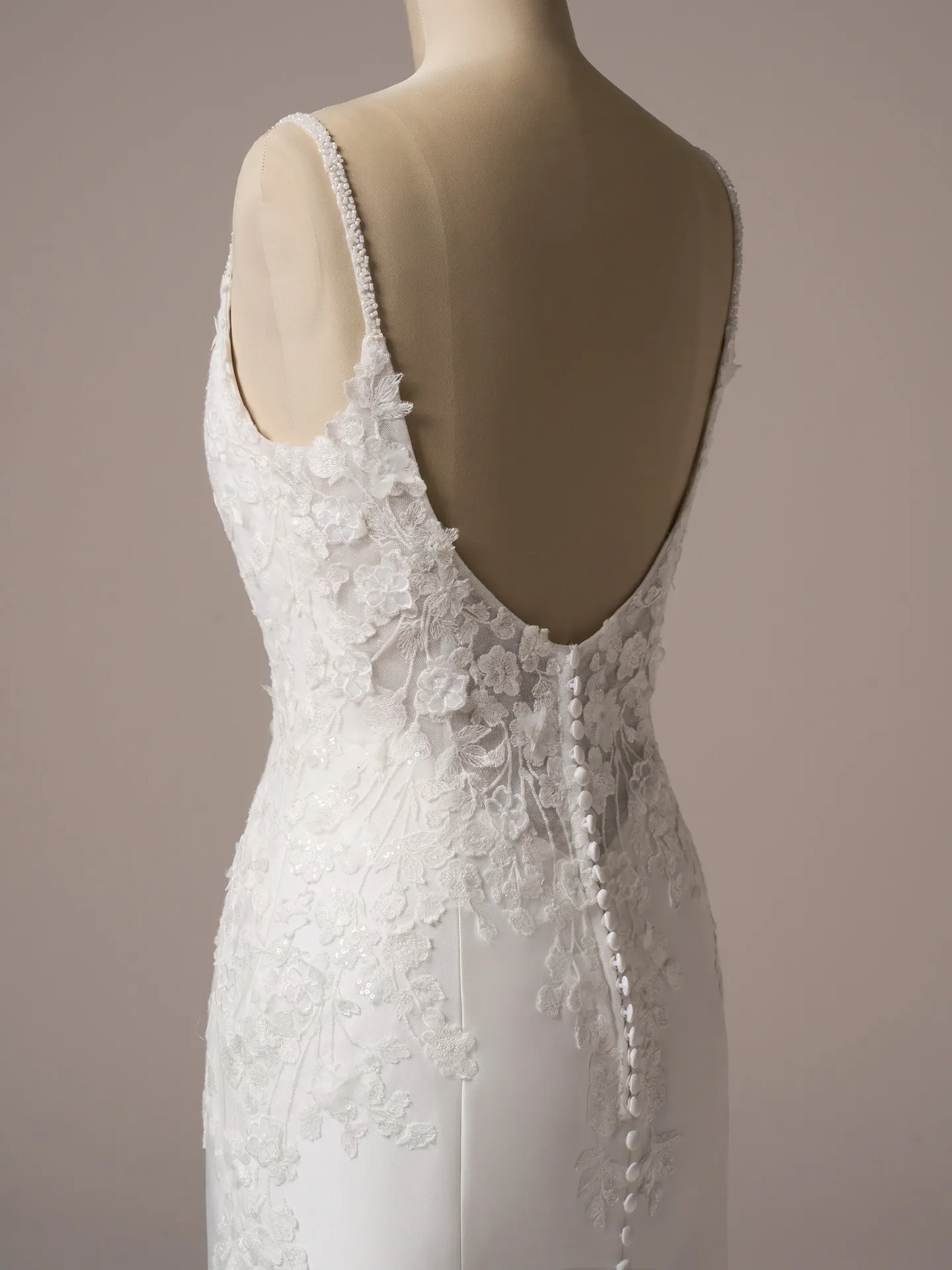 Rebecca Ingram Nova satin V-back mermaid gown back view with lace and button details