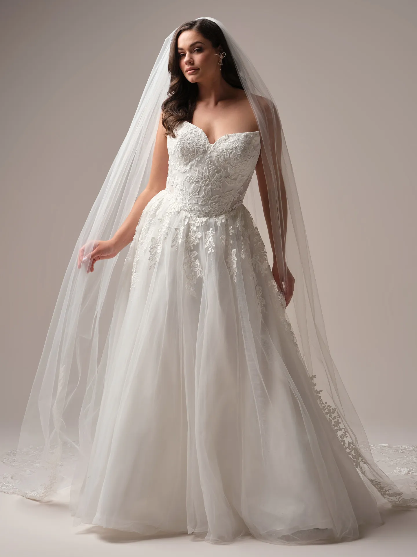 Rebecca Ingram Paige front view A-line wedding dress with sequin details and basque waist.