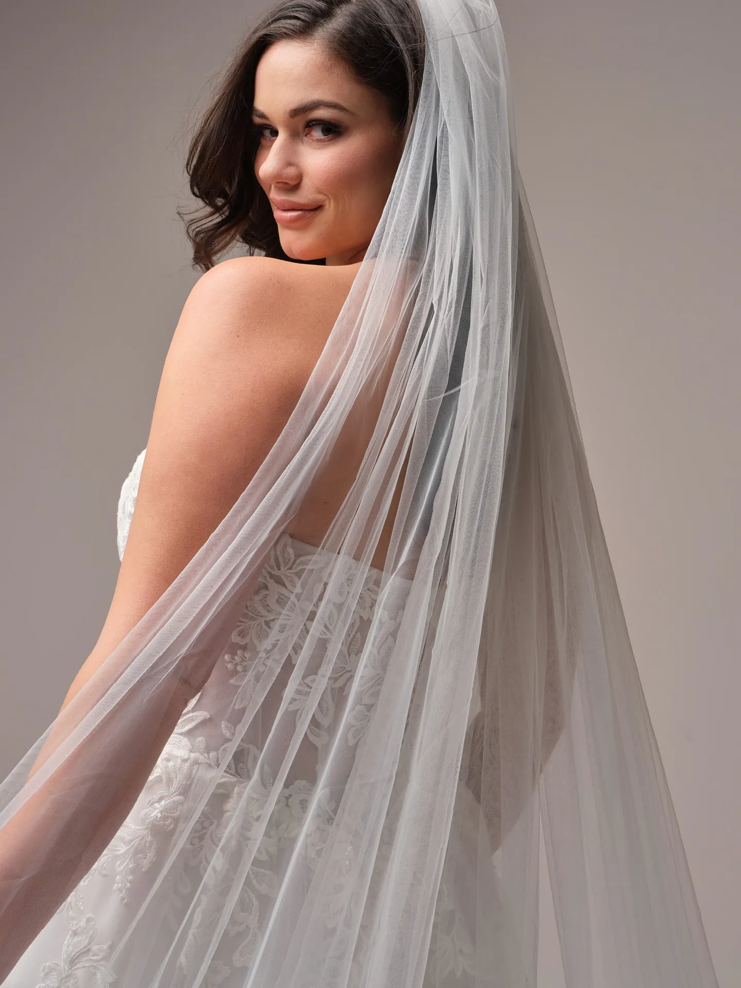 Rebecca Ingram Paige side view with veil and floral lace detail