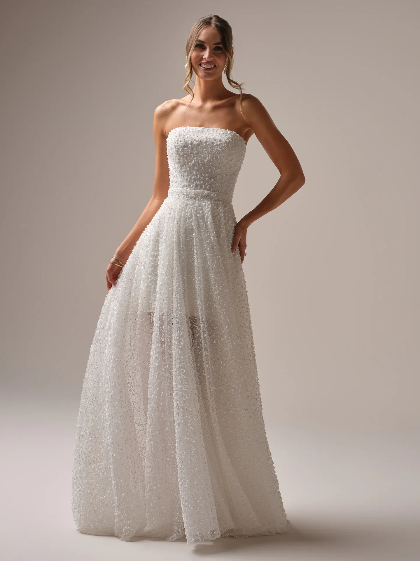 Rebecca Ingram Taylor strapless beaded pearl bridal dress front view