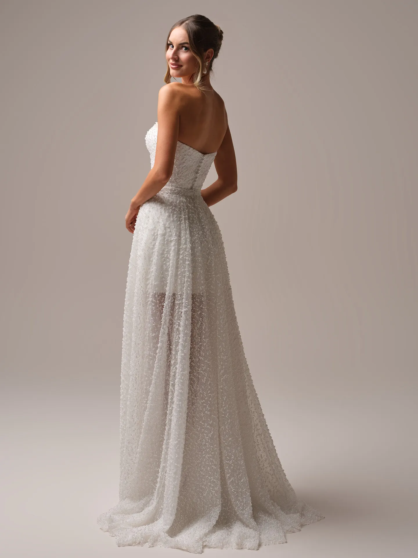 Rebecca Ingram Taylor strapless beaded pearl bridal dress back view