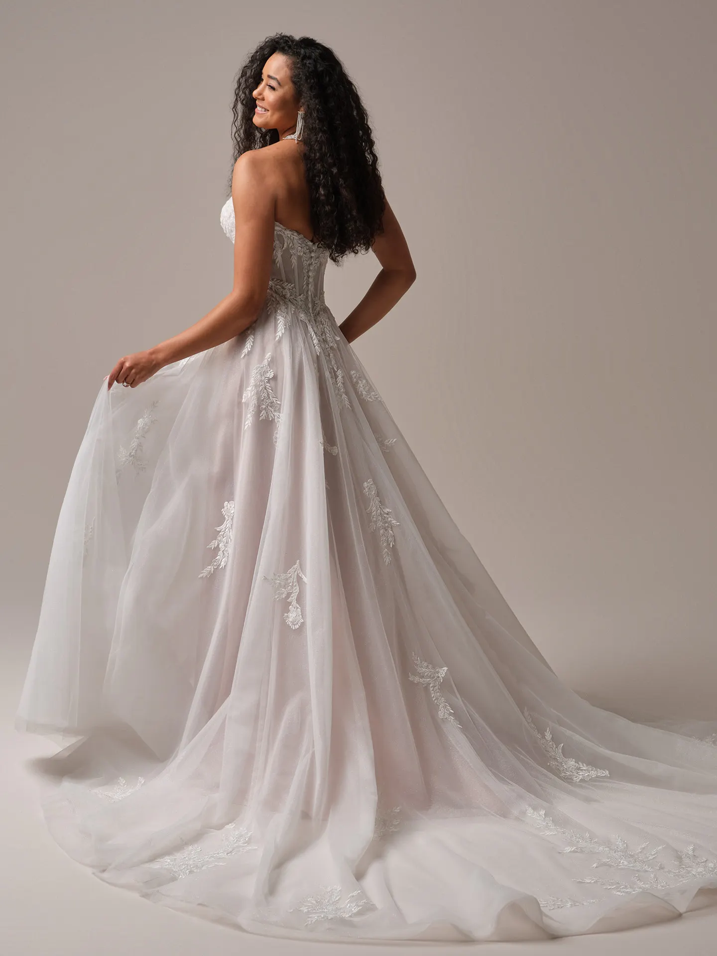 Rebecca Ingram Victoria back view; sparkly A-line bridal gown with floral accents.