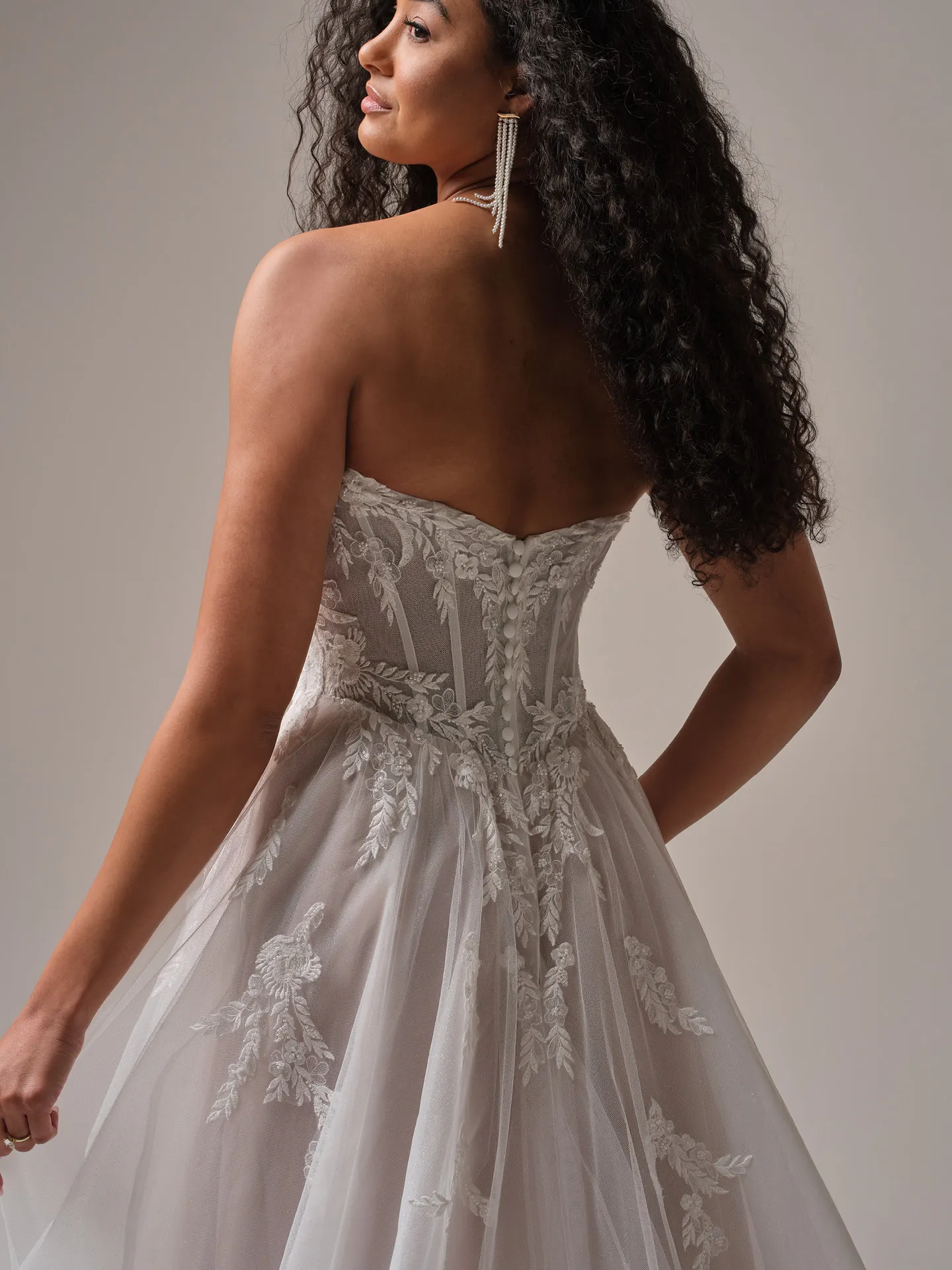 Rebecca Ingram Victoria floral A-line gown back view with lace details.