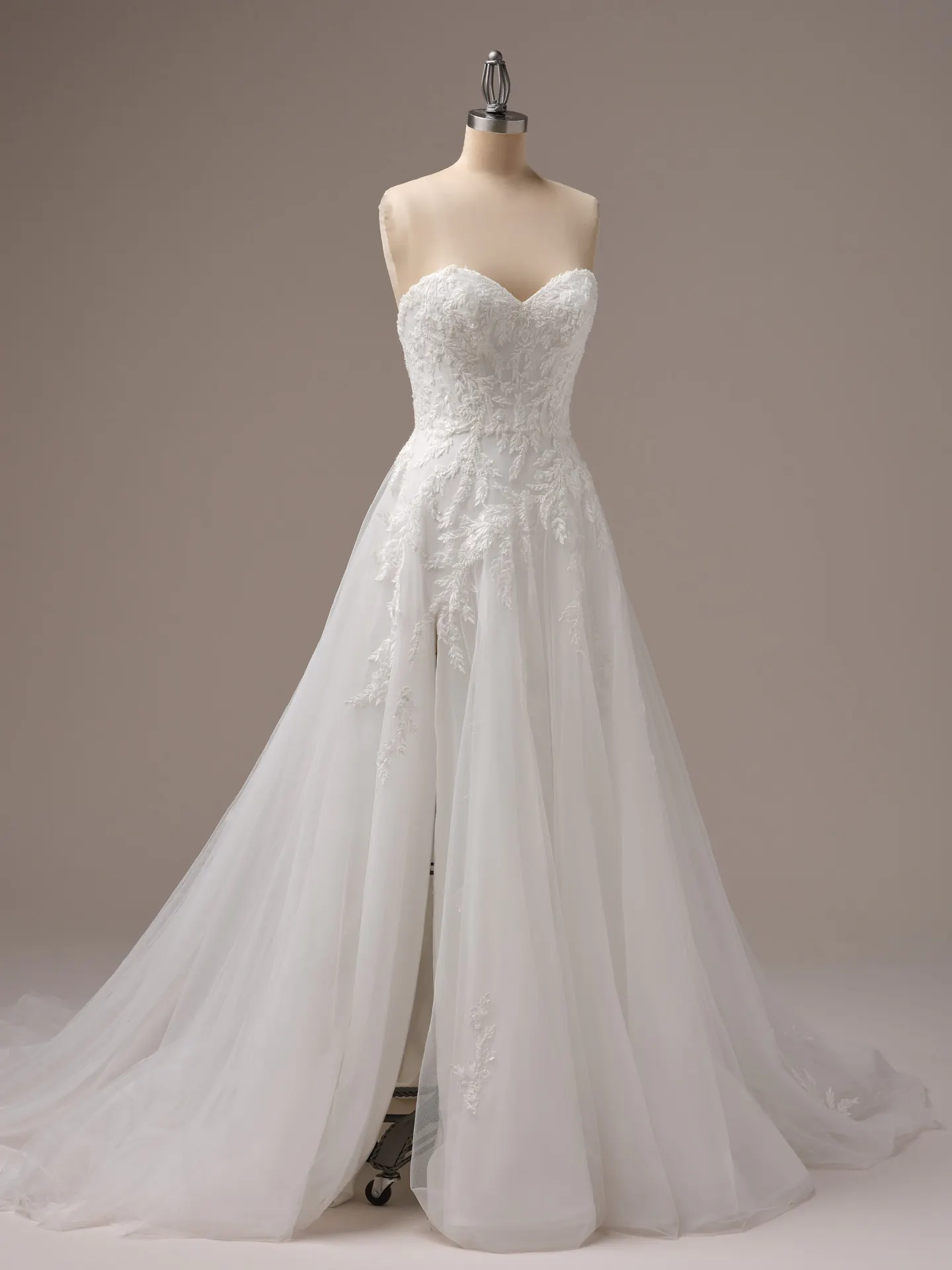Rebecca Ingram Victoria floral A-line gown on mannequin