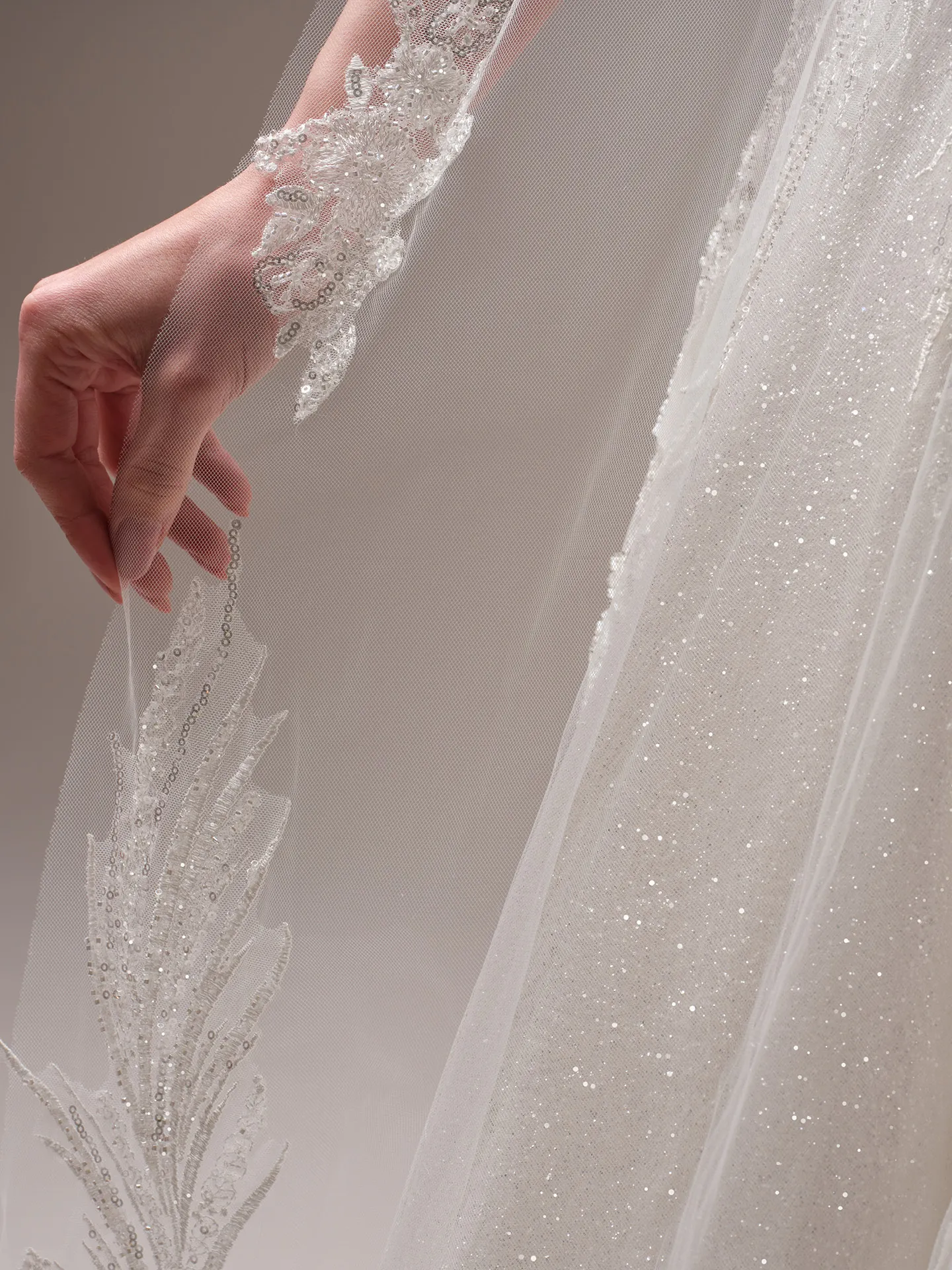 Sottero and Midgley Genevieve ballgown wedding dress side profile with layered skirt