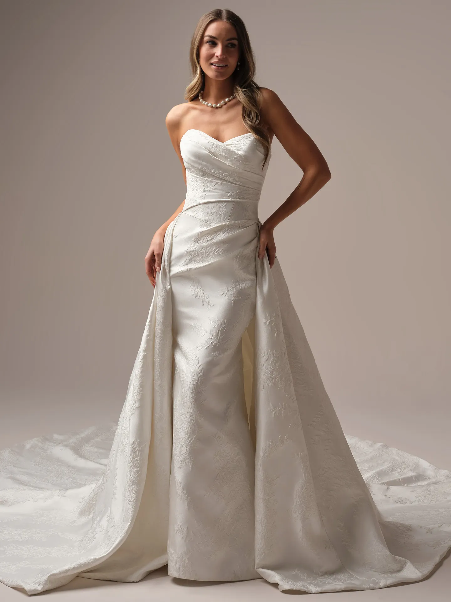 Sottero and Midgley Giselle Marie Lane sheath wedding dress back view with longer train